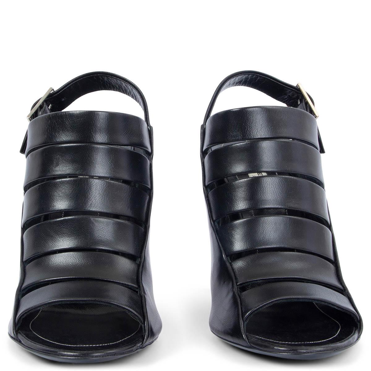 100% authentic Balenciaga sandals in black smooth calfskin with metal buckle closure on the side. Have been worn once inside and are in virtually new condition. Come with dust bag.

Measurements
Imprinted Size	38
Shoe Size	38
Inside Sole	24.5cm