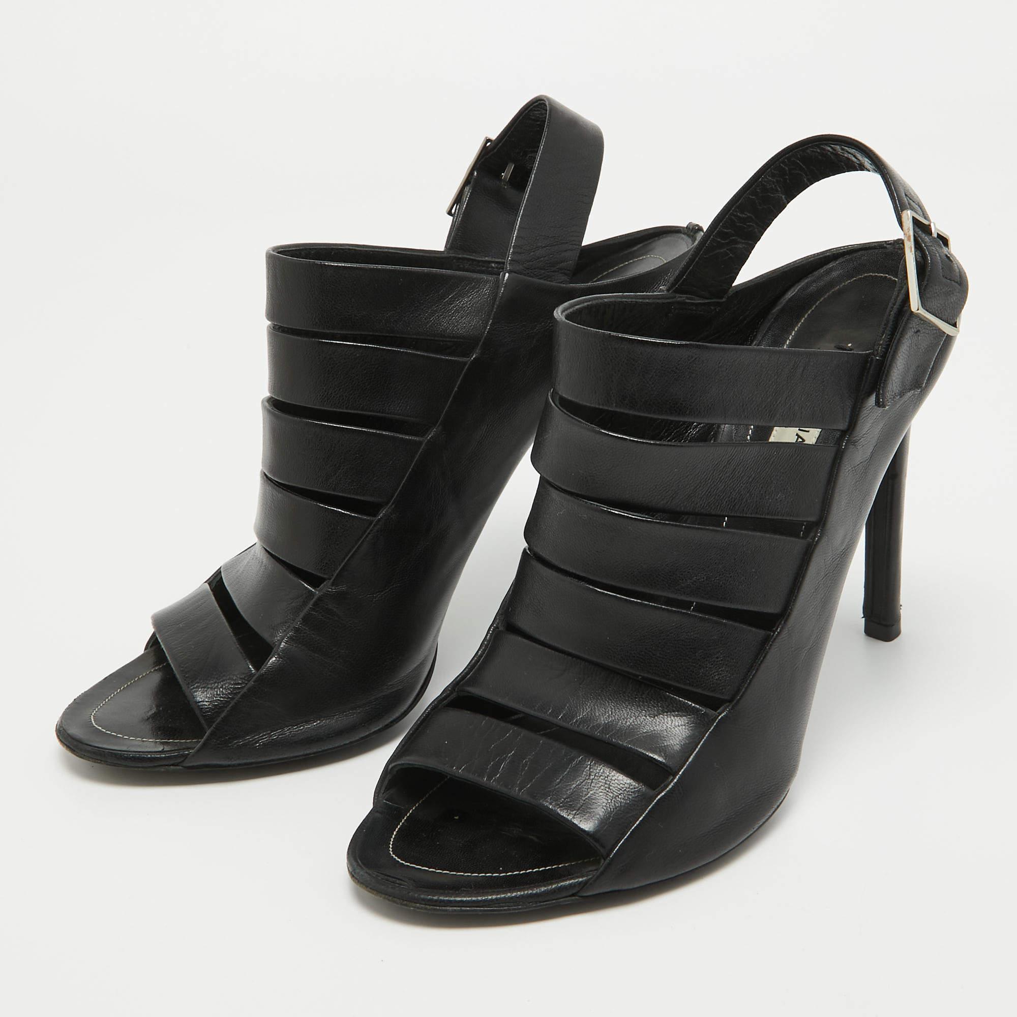Make a statement with these Balenciaga sandals. Impeccably crafted, these chic heels offer both fashion and comfort, elevating your look with each graceful step.
