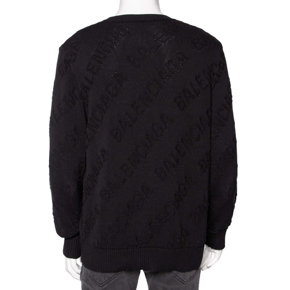 Get ready to exude class, charm, and sophistication as you don this amazing sweater from Balenciaga. It is stitched using black logo-jacquard cotton fabric, which gives it a signature touch. This sweater flaunts an oversized fit and long sleeves.