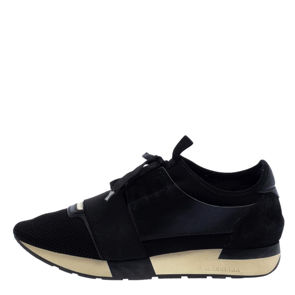 Let your latest shoe addition be this pair of Race Runners sneakers from Balenciaga. These black sneakers have been crafted from leather and mesh and feature a chic silhouette. They flaunt-covered toes, strap detailing on the vamps, and tie-up
