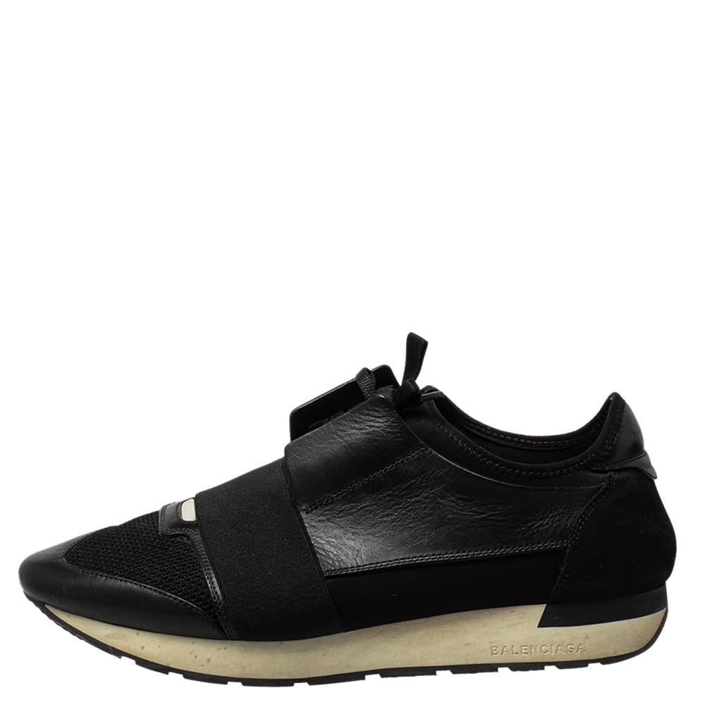 Let your latest shoe addition be this pair of Race Runners sneakers from Balenciaga. These black sneakers have been crafted from suede, leather, and mesh and feature a chic silhouette. They flaunt-covered toes, strap detailing on the vamps, and