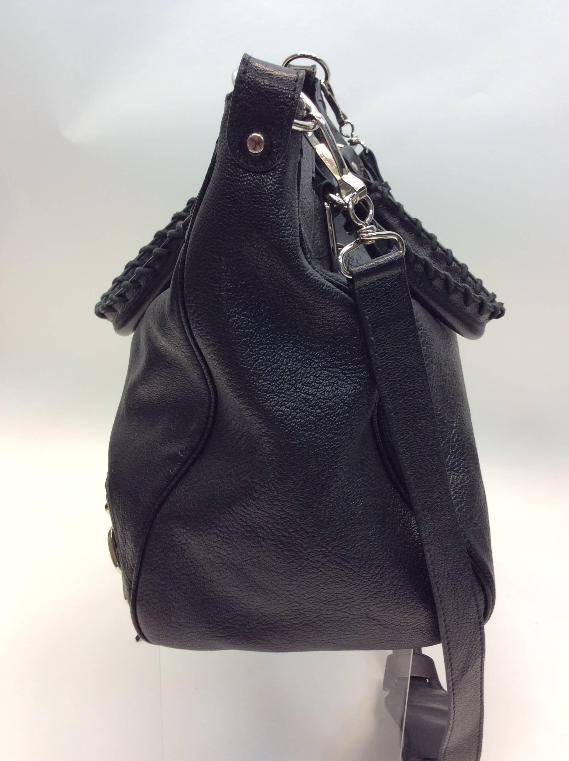 Balenciaga Black Metallic Edge Leather Handbag
Leather
$1699
Made in Italy
14