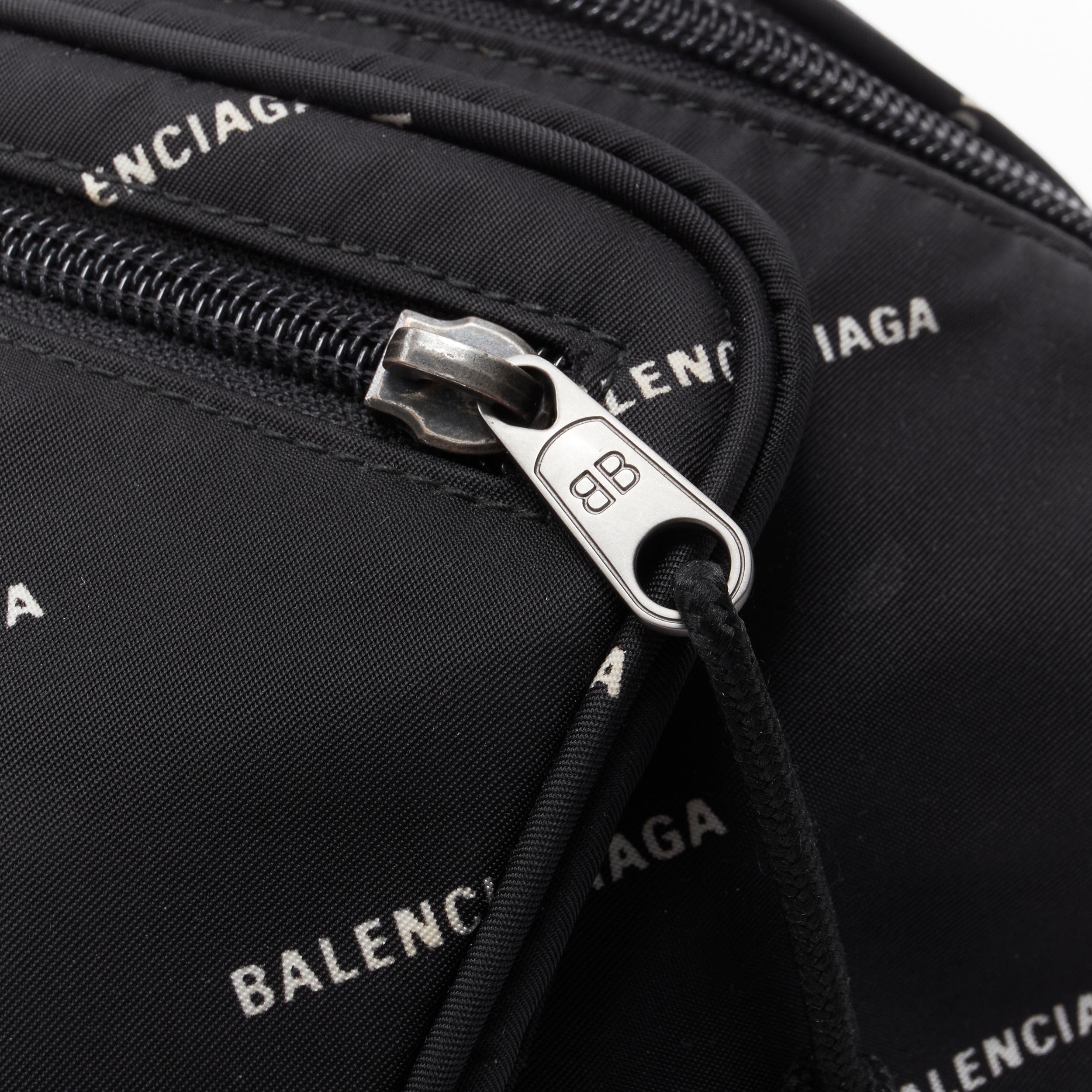 BALENCIAGA black nylon all over white logo print crossbody pouch waist bag In Good Condition In Hong Kong, NT