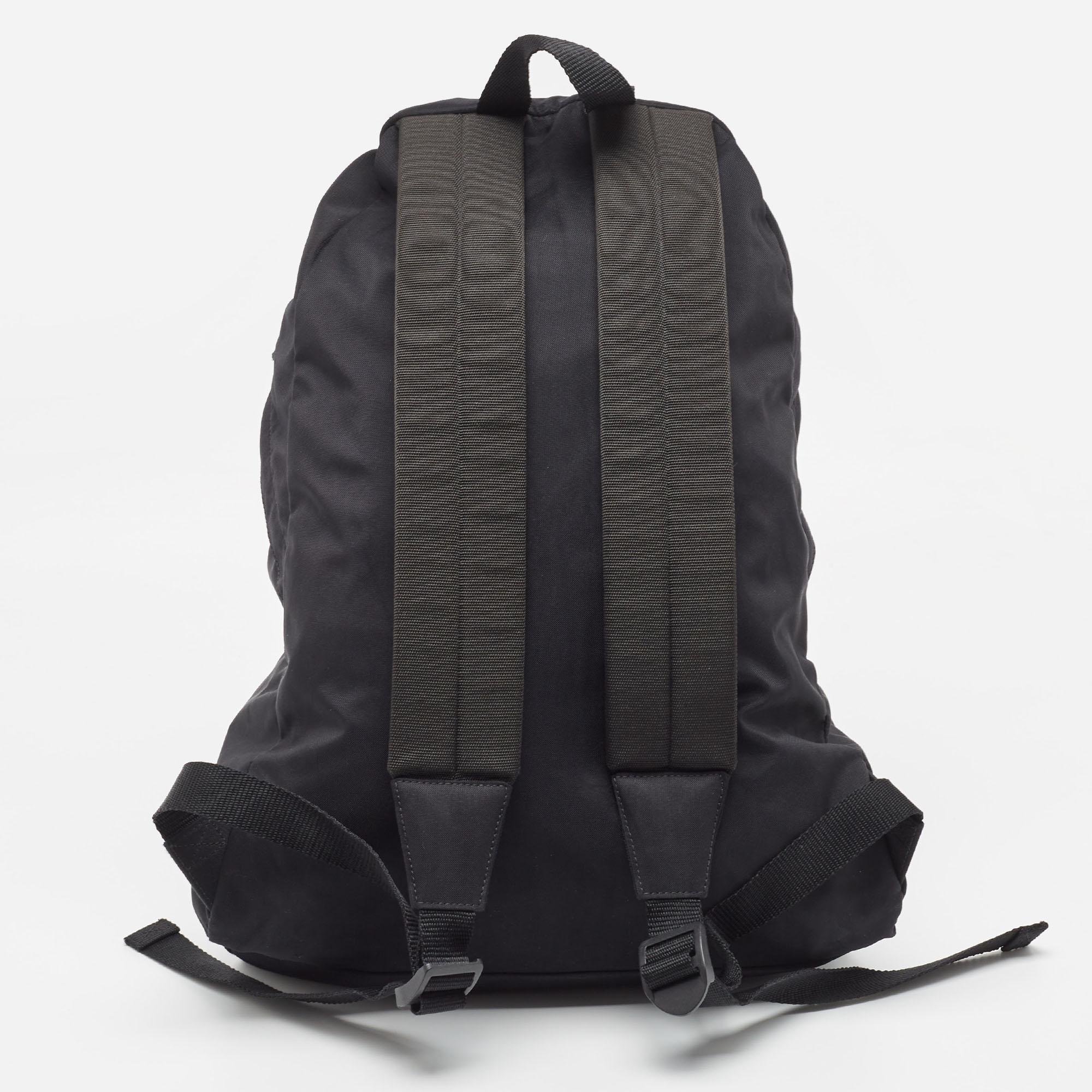 This practical and fashionable backpack will come in handy for daily use or as a style statement. It is smartly designed with a spacious interior for your belongings. Two shoulder straps make it ready to be yours.

Includes: Original Dustbag, Info