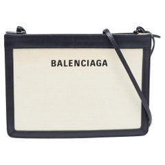 Balenciaga - Sac à bandoulière en toile et cuir noir/off-White - Pochette marine