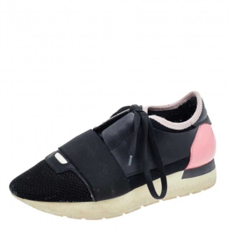 Sport a trendy look as you flaunt these Race Runner sneakers from Balenciaga. They are made from black-pink mesh and leather into a sturdy shape. Their vamps feature patent leather trims and a lace-up fastening. Update your collection with these