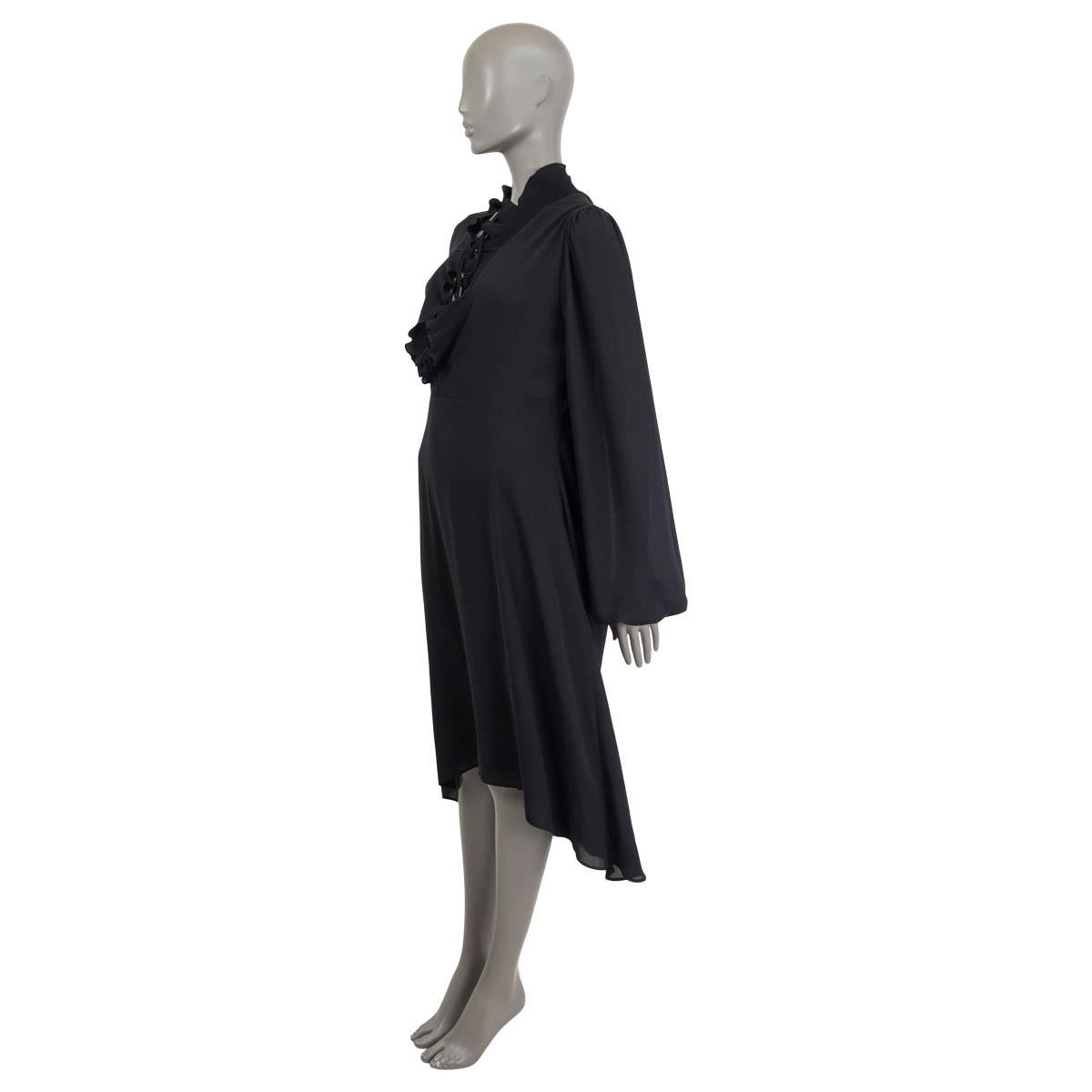 100% authentic Balenciaga oversized asymmetric dress in black polyester (100%). Features a high neck with a drawstring closure and long bell sleeves. Unlined. Has been worn and is in excellent condition.

Measurements
Tag Size	36
Size	XS
Shoulder