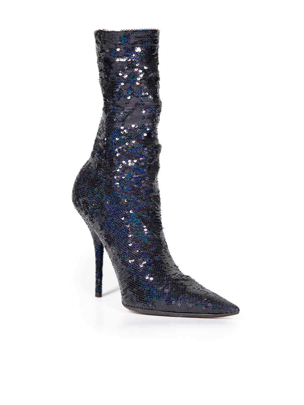 CONDITION is Very good. Hardly any visible wear to boots is evident on this Balenciaga designer resale item. These boots have been partially re-soled.
 
 
 
 Details
 
 
 Model: Knife
 
 Black
 
 Sequin
 
 Ankle boots
 
 Point toe
 
 Slip on
 
 High