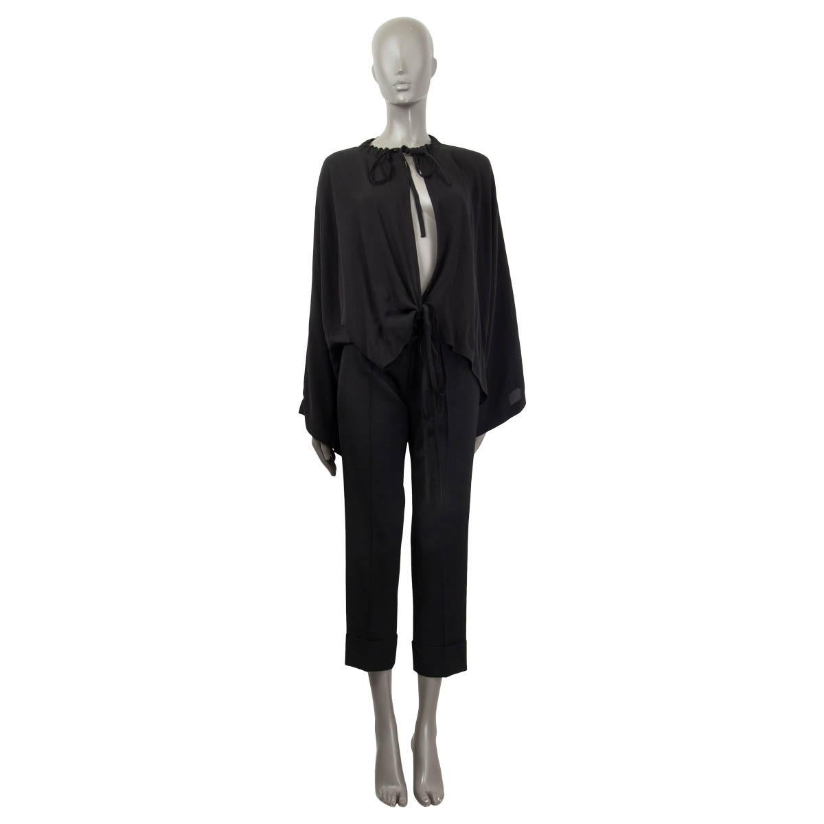 100% authentic Balenciaga 2016 oversized batwing wrap blouse in black silk (100%). Features a self tie bow at the neck. Unlined. Has been worn and is in excellent condition.

Measurements
Tag Size	36
Size	XS
Bust To	140cm (54.6in)
Waist To	140cm