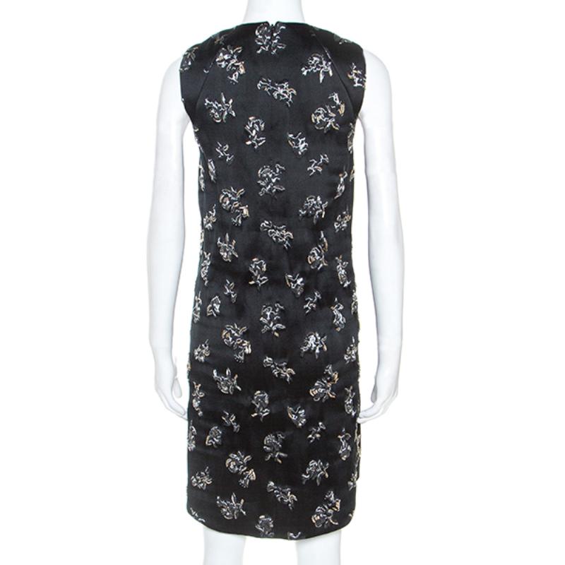 This dress from Balenciaga is so pretty, you'll love wearing it. The fabulous creation is made of blended fabric and features an elegant design with embellishments all over and a sleeveless style. Pair it with gold sandals for a winning look.

