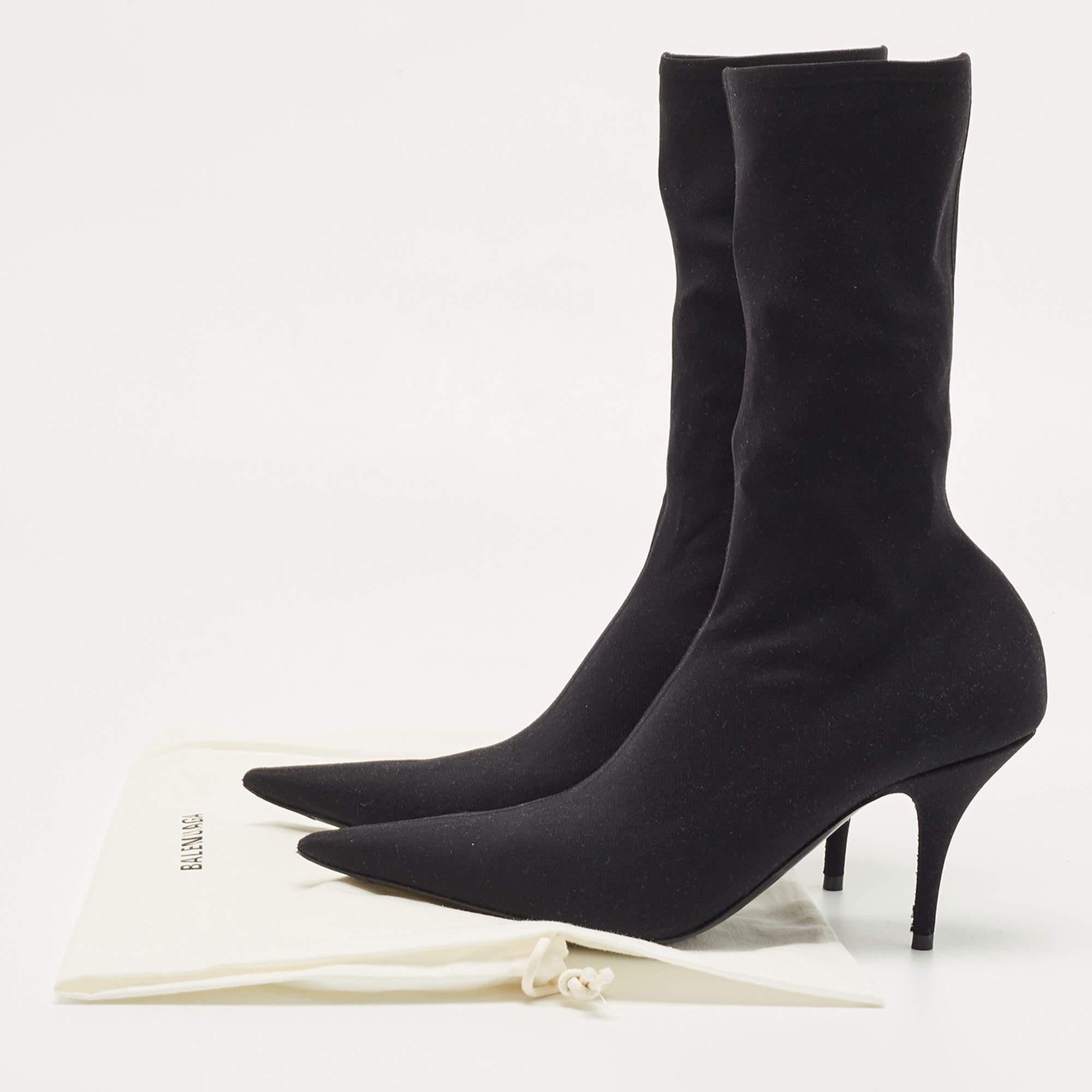 Deliver statement looks with these black Knife booties from Balenciaga! From their shape and detailing to their overall appeal, they exude sophisticated style.

