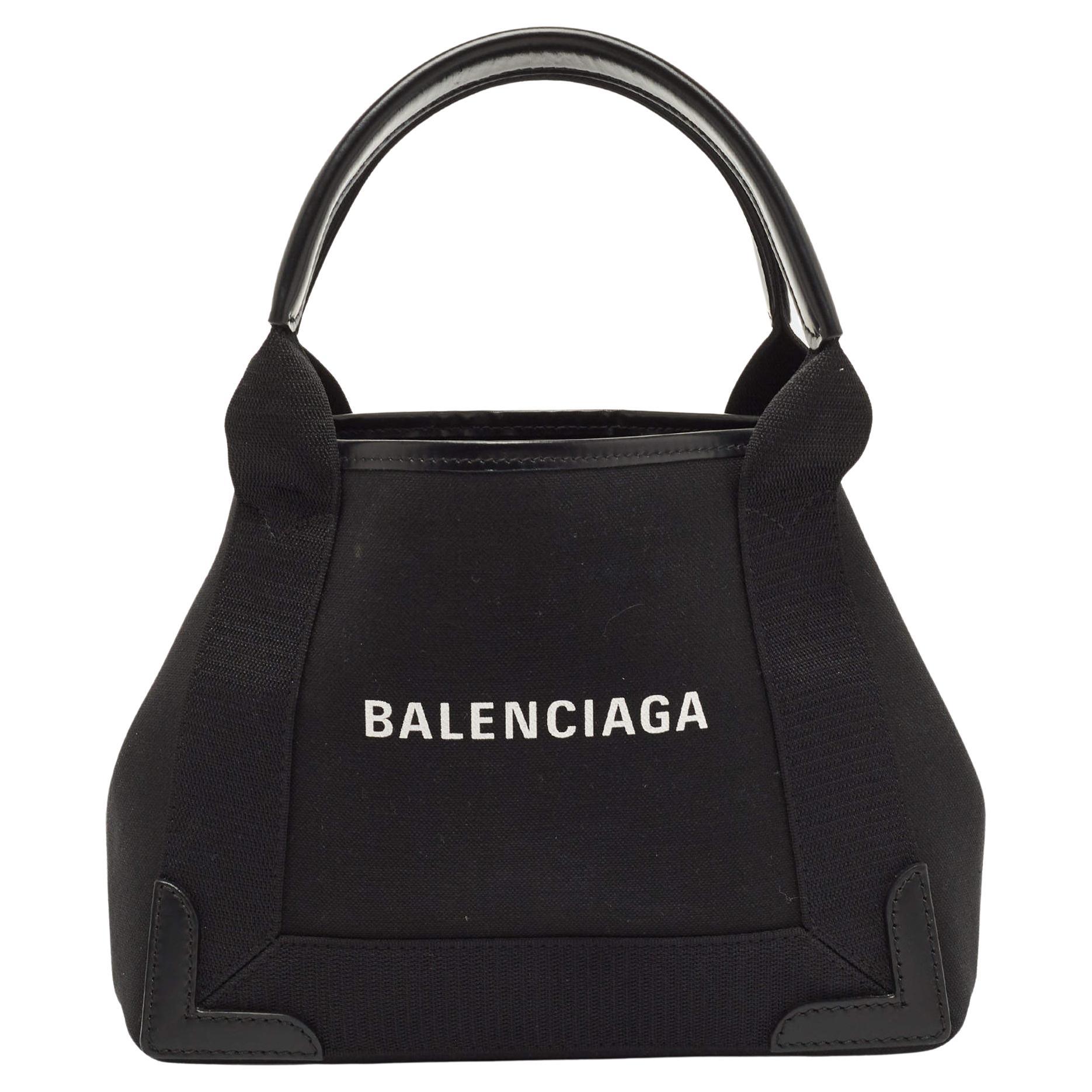 white and black balenciagas