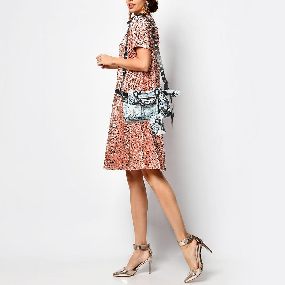 Functional and stylish, this designer label's collections capture the effortless, elegant finesse of the modern woman. Crafted from quality materials, this chic bag is easy to carry and can fit in your daily essentials effortlessly.