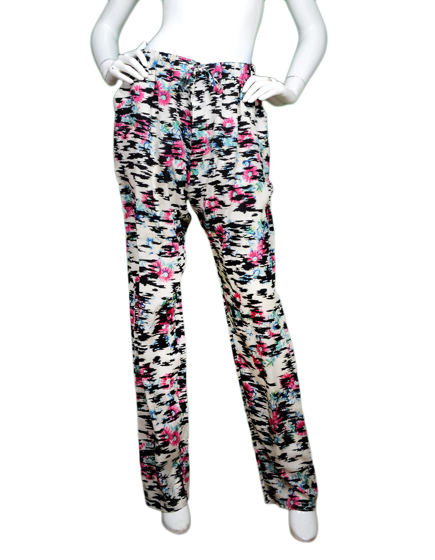 Balenciaga Black/White Silk Pants W/ Pink Flowers Sz 34

Made In:  China
Color: Black, white, pink, blue/green
Materials: 100% silk
Closure/Opening: Button fly with tie top
Overall Condition: Excellent pre-owned condition 

Measurements: 
Waist: 31