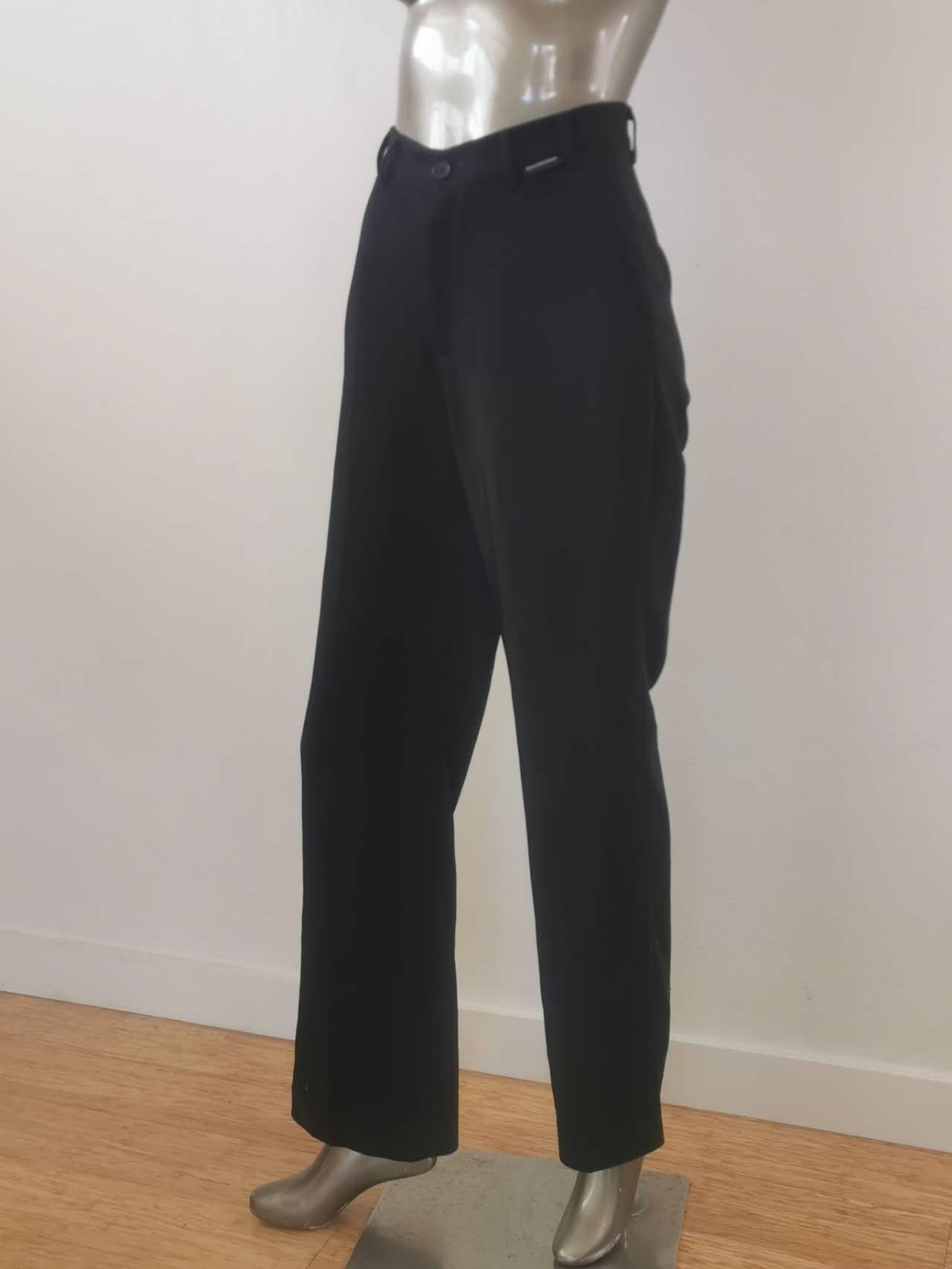 Brand: Balenciaga
Product Name: Black Wide Leg Tailored Pants SZ 34

Product Description:
Elevate your style with these Balenciaga Black Wide Leg Tailored Pants. Crafted with meticulous attention to detail, these pants offer a sleek and