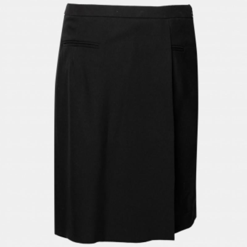 This super-classy Balenciaga skirt is beautifully tailored to become a closet favorite. It has a simple look, a zip closure, three pockets, and an asymmetric overlay detail at the front.
