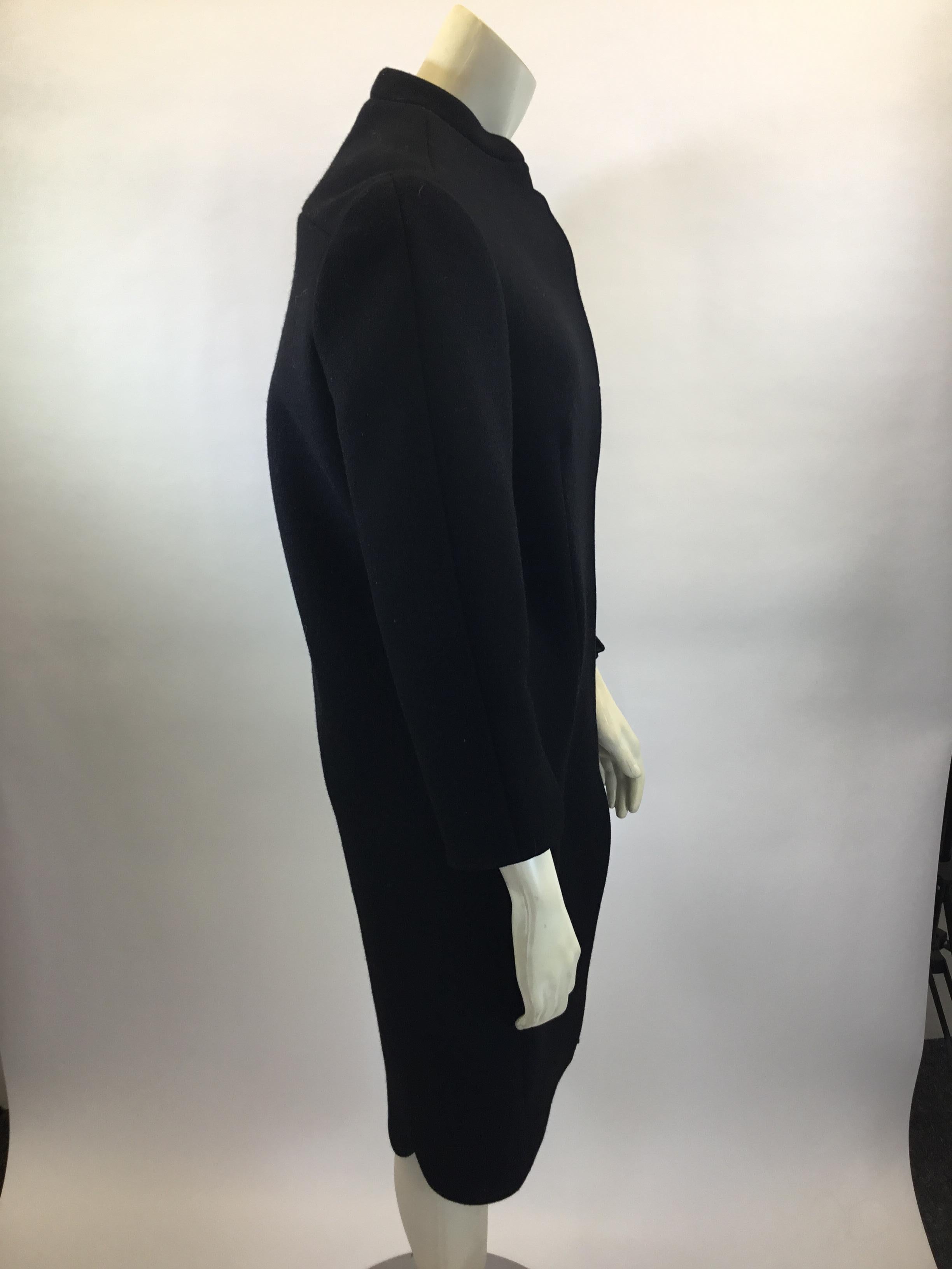 Balenciaga Black Wool Coat
$299
Made in France
94% Wool, 4% Elastane
Size 38
Length 38.5”
Bust 40”
Waist 40”