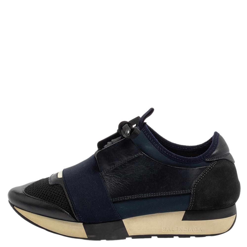 Let your latest shoe addition be this pair of Race Runner sneakers from Balenciaga. These blue and black sneakers have been crafted from suede, leather, fabric, and mesh and feature a chic silhouette. They flaunt covered toes, strap detailing on the