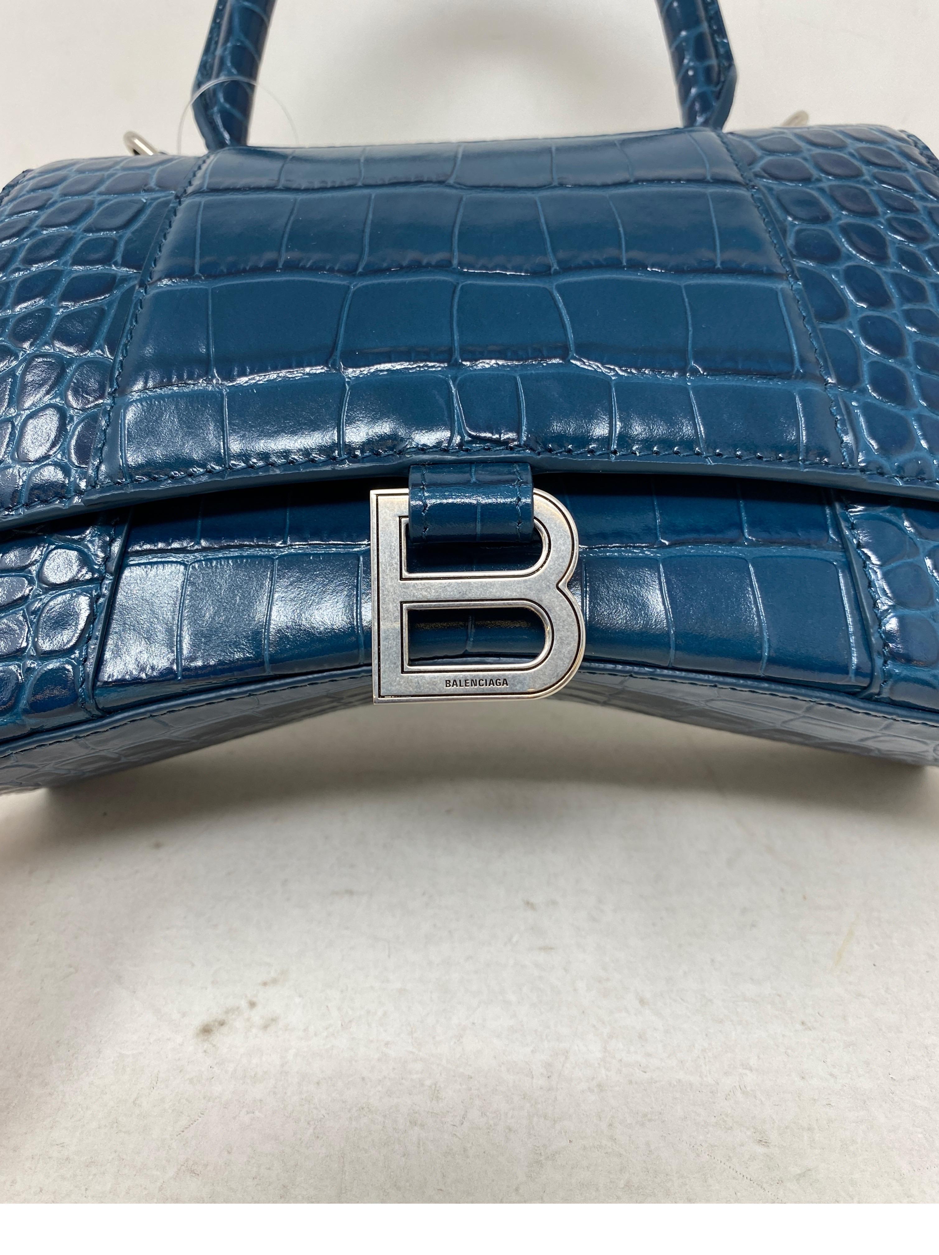 Balenciaga Blue Croc Embossed Hourglass Bag. Small size hourglass bag. Beautiful blue leather. Silver hardware. Unique bag by Balenciaga. Includes dust cover. New with tags. Guaranteed authentic. 