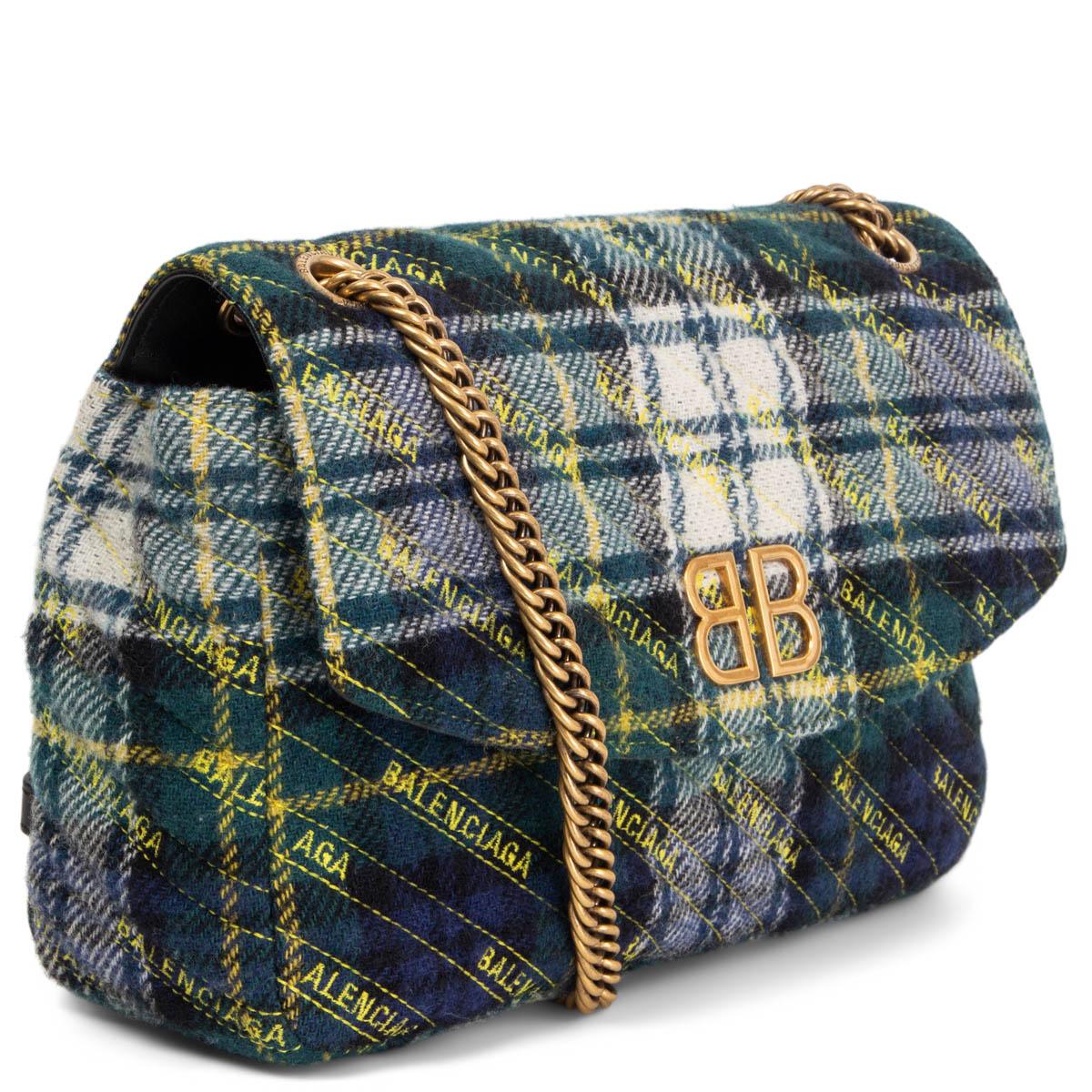 100% authentic Balenciaga BB Medium Chain Quilted Tartan Shoulder Bag in petrol, yellow, blue and off-white wool featuring gold-tone chain shoulder-strap and BB metal logo at front. Opens with a flap and magnetic button. Lined in black smooth