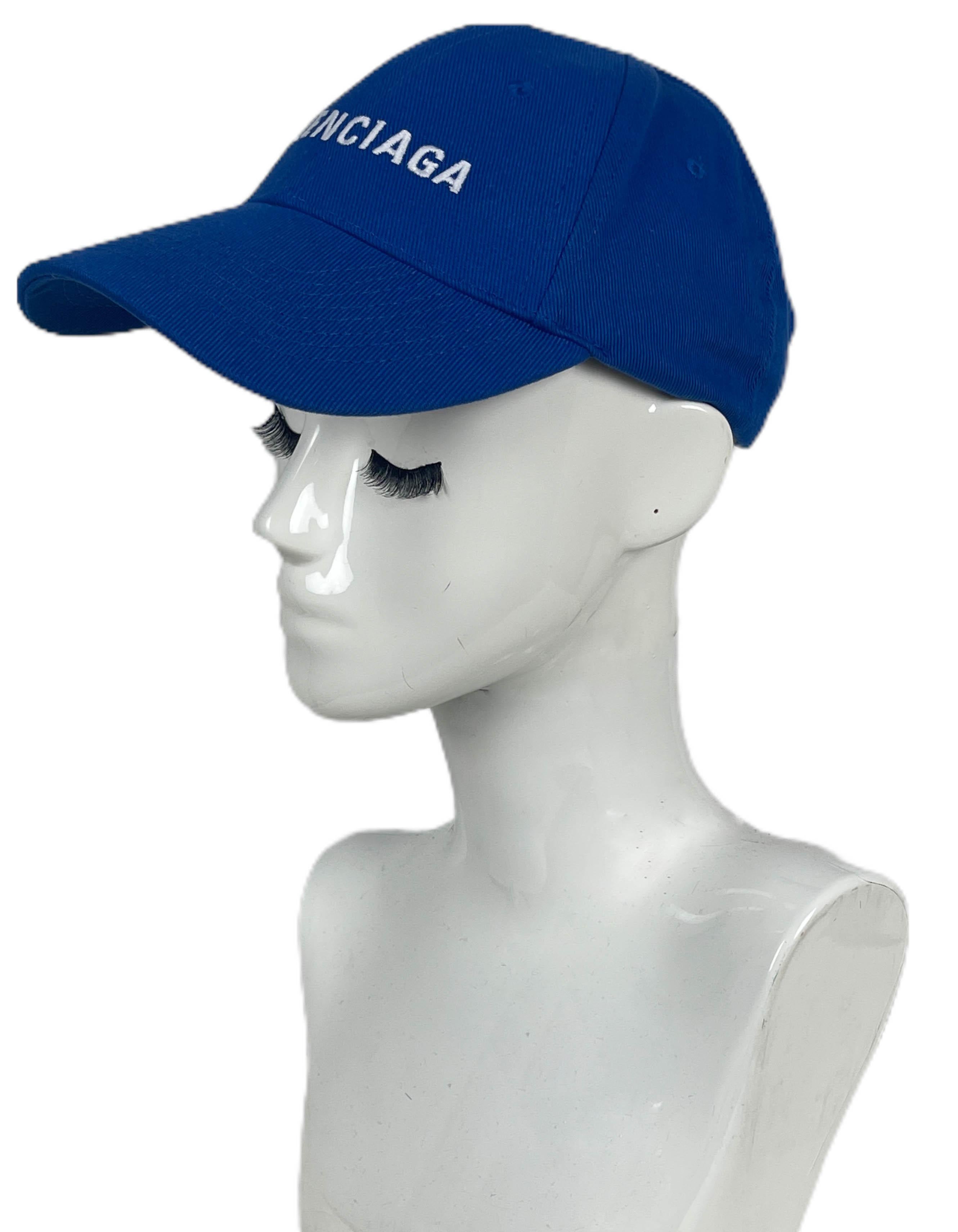 Balenciaga Blue Logo Baseball Cap sz L

Made In: Italy
Color: Blue
Hardware: None
Materials: 100% cotton 
Condition: Excellent with light wear to the front underside
Includes: Dustbag

Measurements: size Large/ 58cm with adjustable back strap