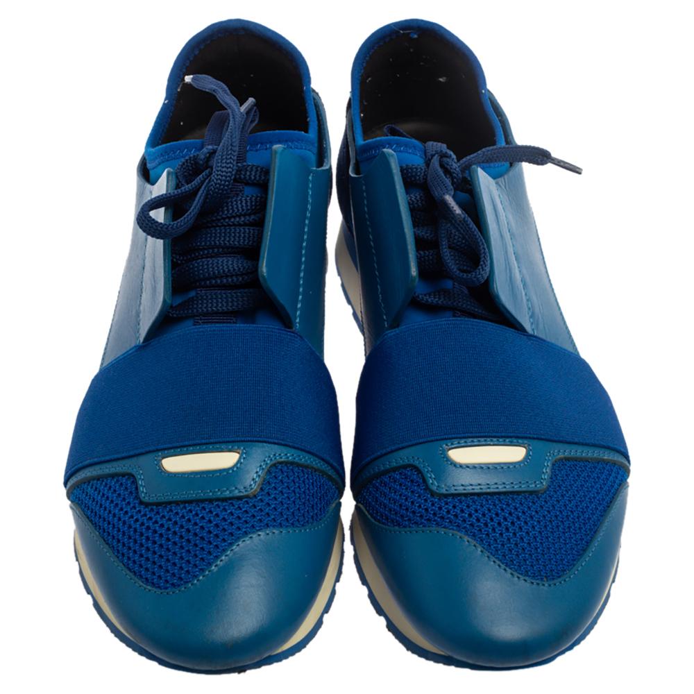 Let your latest shoe addition be this pair of Race Runners sneakers from Balenciaga. These Blue sneakers have been crafted from mesh, suede, and leather and feature a smart silhouette. They flaunt covered toes, strap detailing on the vamps, and