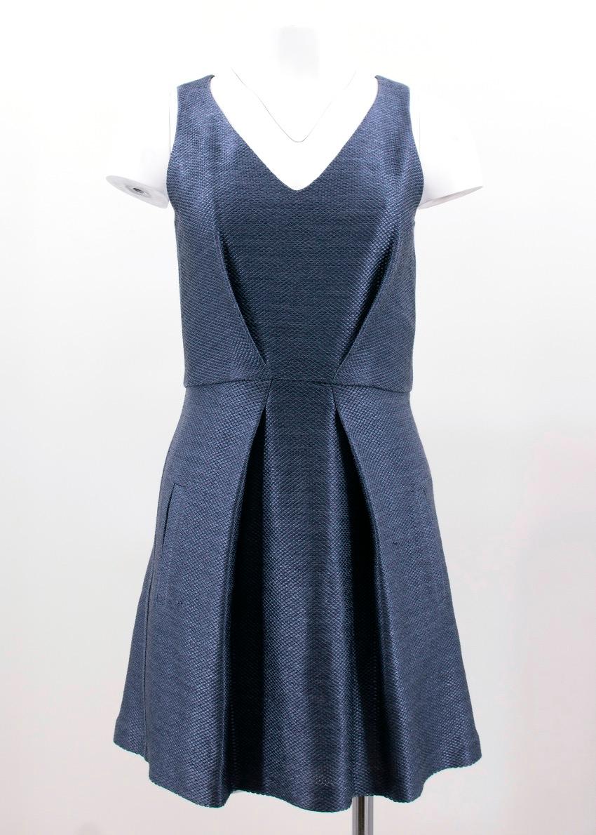 Balenciaga shiny blue a line sleeveless v neck dress with geometric pleats and pockets on front.

Fabrics: 50% Cotton and 50% Rayon.

Please note, these items are pre-owned and may show signs of being stored even when unworn and unused. This is