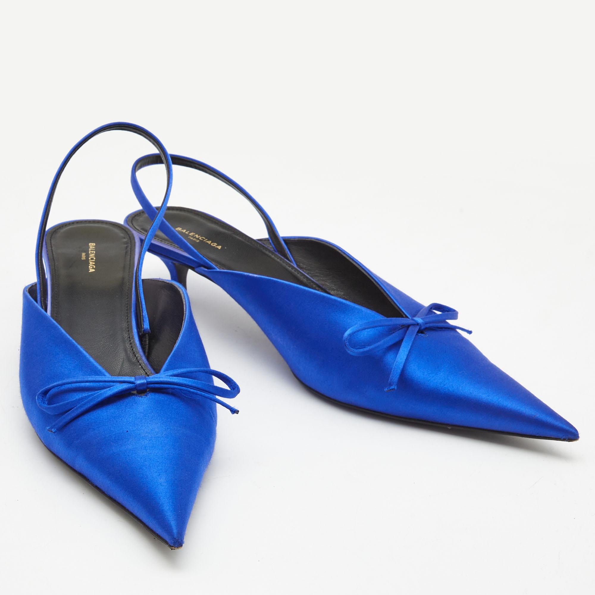 Sleek and sharp, this pair of Balenciaga pumps will complement a variety of outfits in your wardrobe. The satin creation features a blue hue and leather insoles. Elevated on 4.5cm heels, it will take your fashion statement a notch higher.

