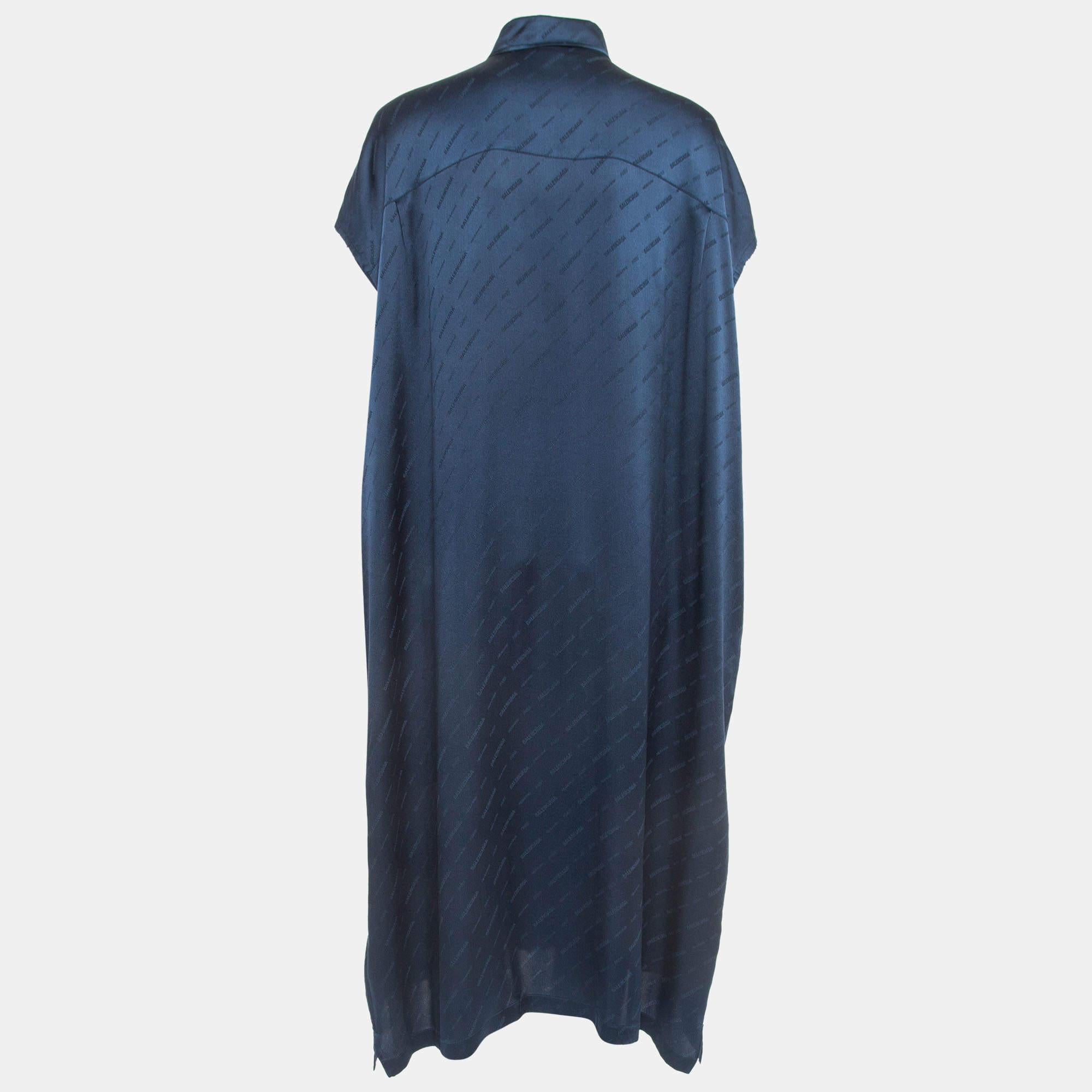 Exhibit a stylish look by wearing this beautiful designer Balenciaga dress. Tailored using fine fabric, this dress has a chic silhouette for a framing fit. Style the creation with chic accessories and pumps. It is an oversized shirt dress with raw