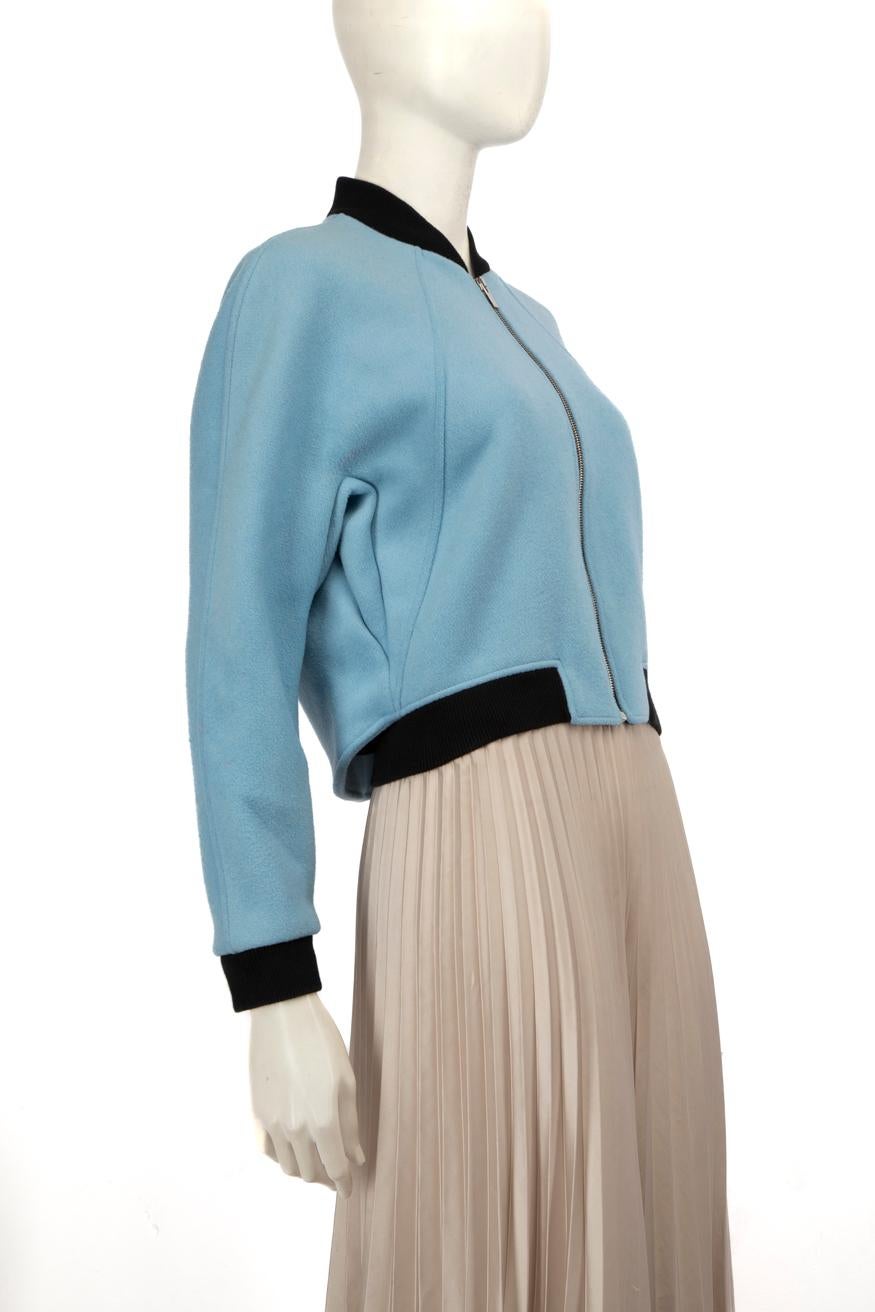 CONDITION is Very good. Minimal wear to the jacket is evident, there is a mak on the front left sleeve near the underarm and a small mark on the right sleeve. There is minor pilling to the fabric on back of the sleeves and the top of the shoulders