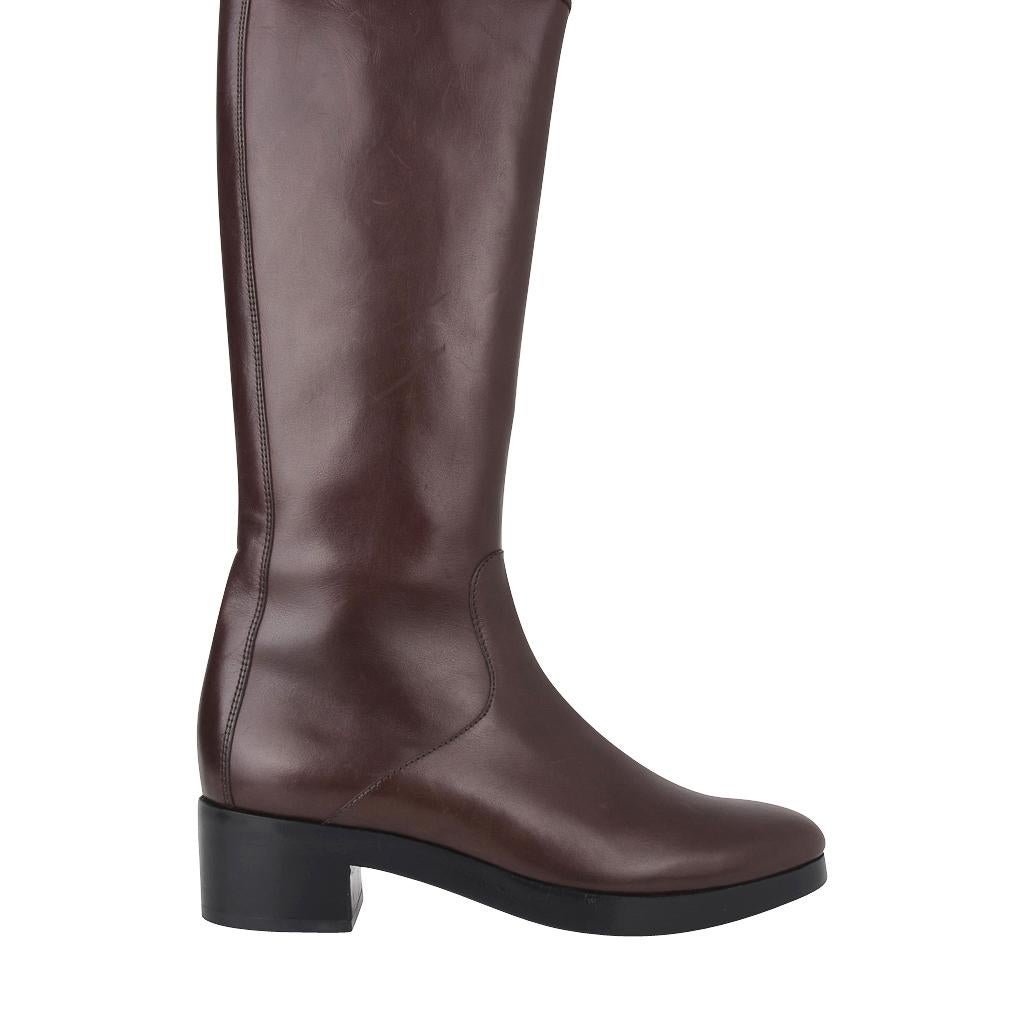 Guaranteed authentic Balanciaga clean lined knee high boots. 
Small platform and perfect toe for a timeless classic boot.
Side zipper for easy access.  
Rear has a stitch detail.
NEW or NEVER WORN.
Light natural marking in certain light.
final