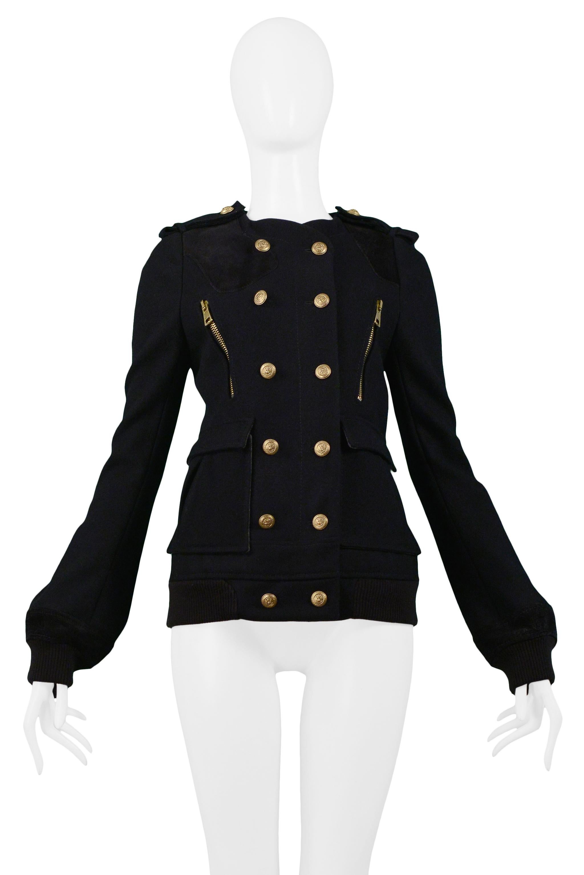 Resurrection is pleased to offer a vintage Balenciaga by Nicolas Ghesquiere black wool double-breasted military-inspired jacket with gold buttons at center front and shoulders, velvet patches at shoulders, flap pockets at hips, and knit bands at
