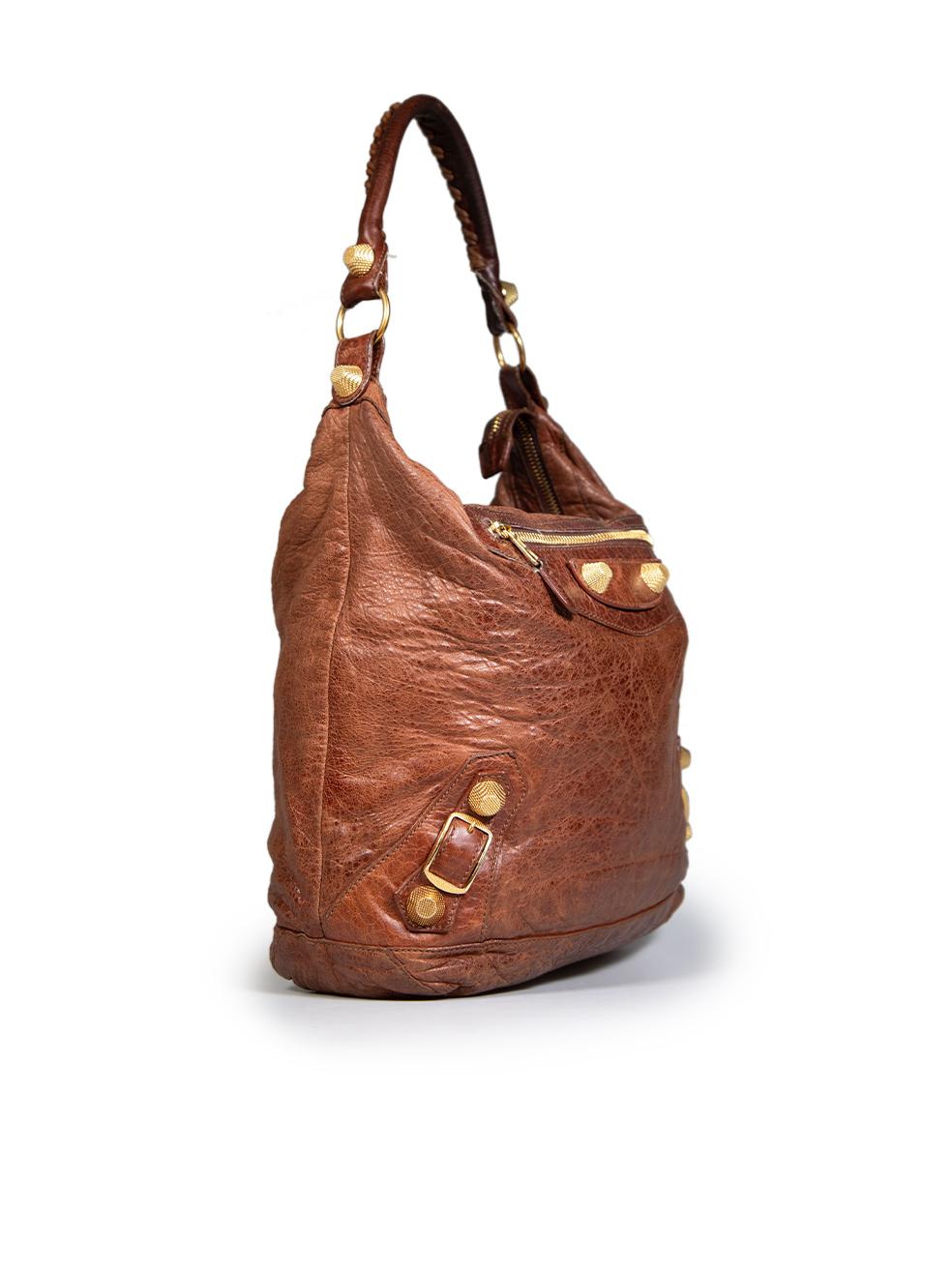 CONDITION is Good. General wear to bag is evident. Moderate signs of wear to the handle tabs, zip pullers, top handle and the front zip pocket seams with multiple loose threads on this used Balenciaga designer resale item. Comes with dust bag.
 

