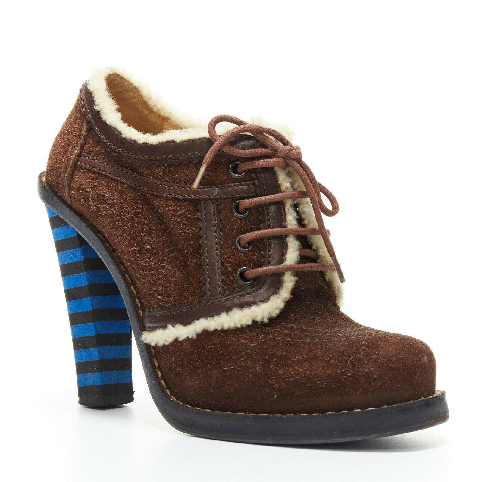 BALENCIAGA brown suede shearling lace-up ankle boot blue chunky strip heel EU37 
Reference: EACN/A00084 
Brand: Balenciaga 
Designer: Demna Gvasalia 
Material: Leather 
Color: Brown 
Pattern: Solid 
Closure: Lace Up 
Extra Detail: Preppy style ankle