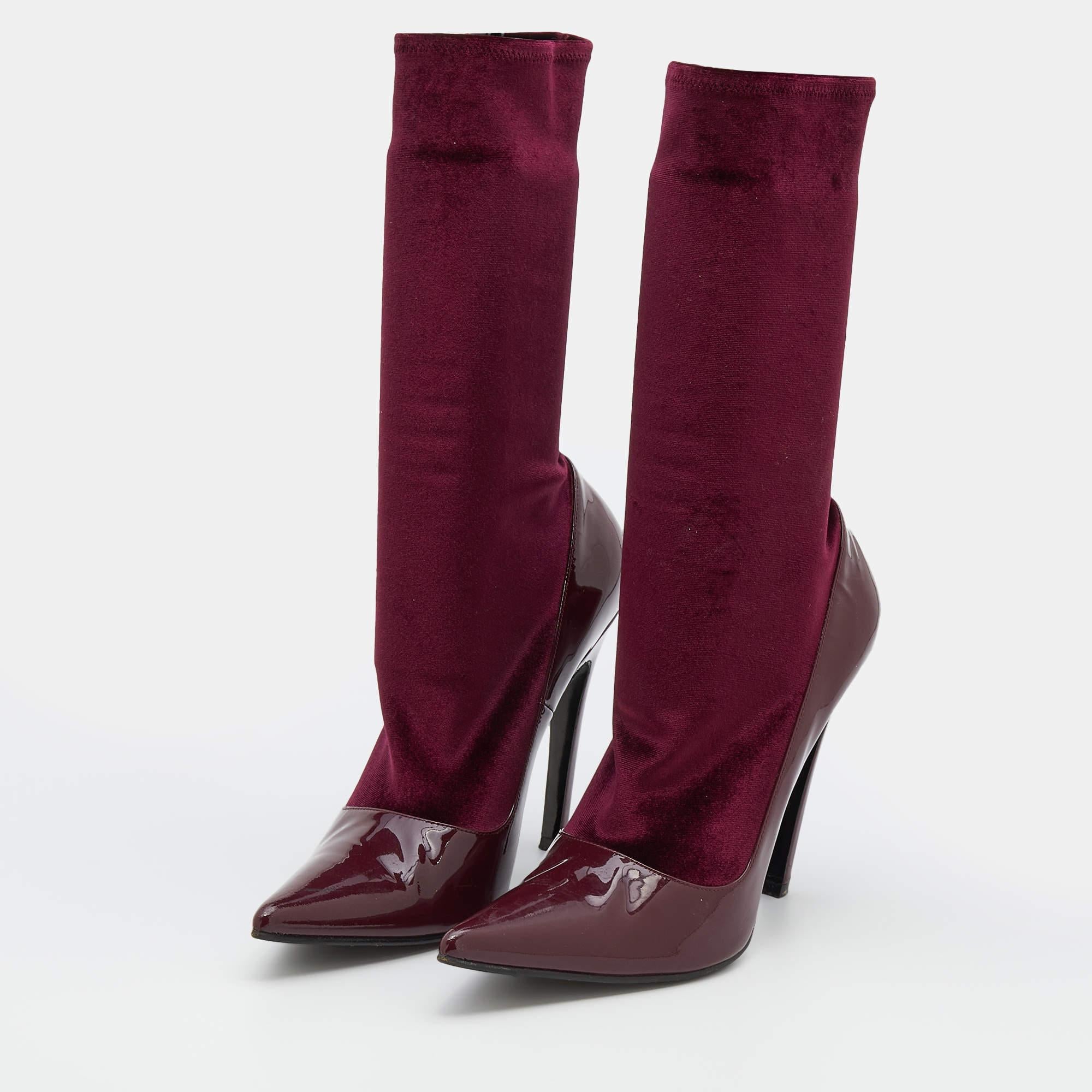 Make the world your runway in these stylish yet sophisticated boots from Balenciaga. Coming in gorgeous burgundy patent leather and velvet, the sock-style boots are a must-have in every fashionista's shoe collection. Pair them with a dress or skirt