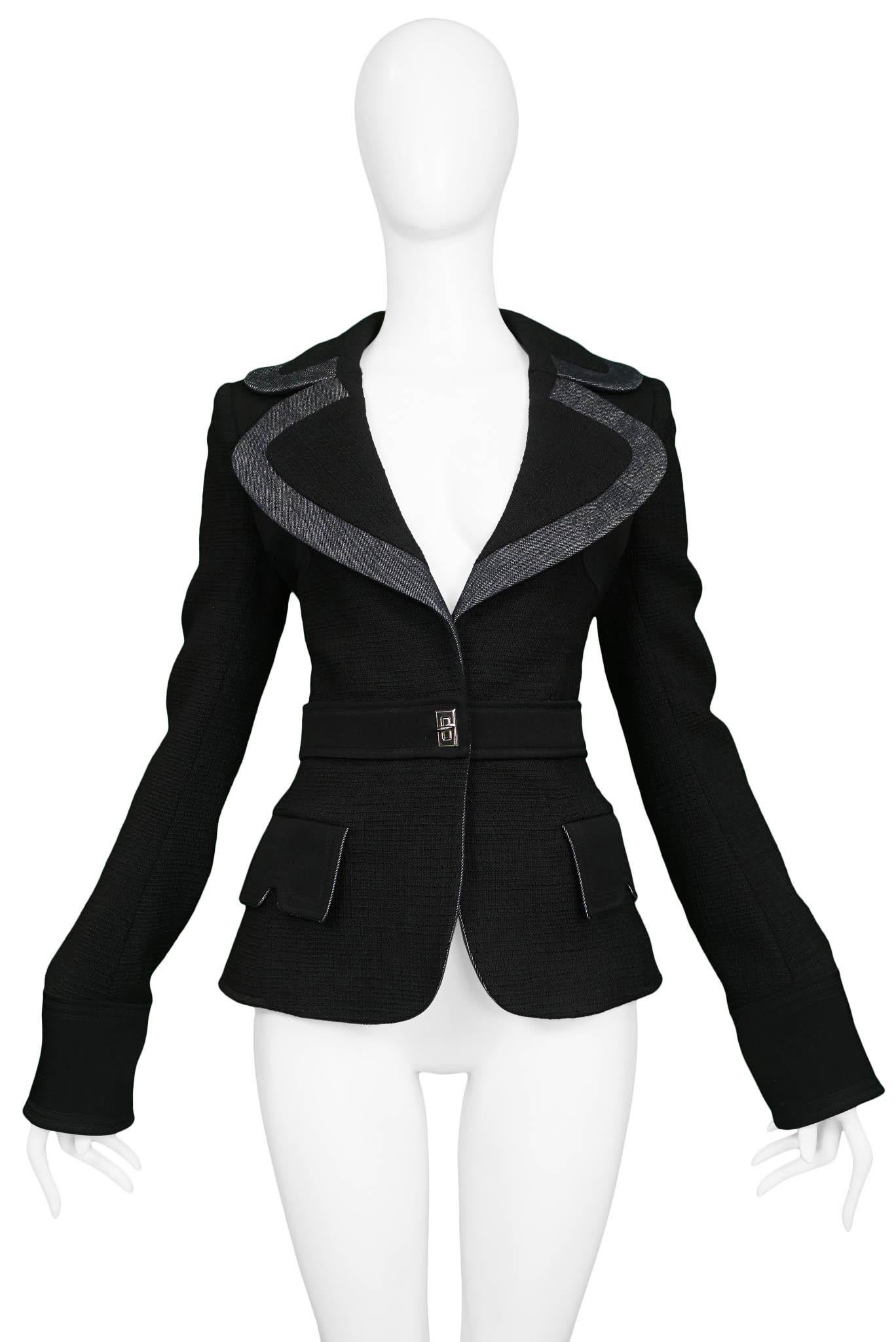 Resurrection Vintage is excited to offer of vintage Balenciaga by Nicolas Ghesquière black fitted blazer jacket featuring an extra-wide and round lapels and collar, an attached belt with silver hardware clasp, side pocket flaps, skinny extra long