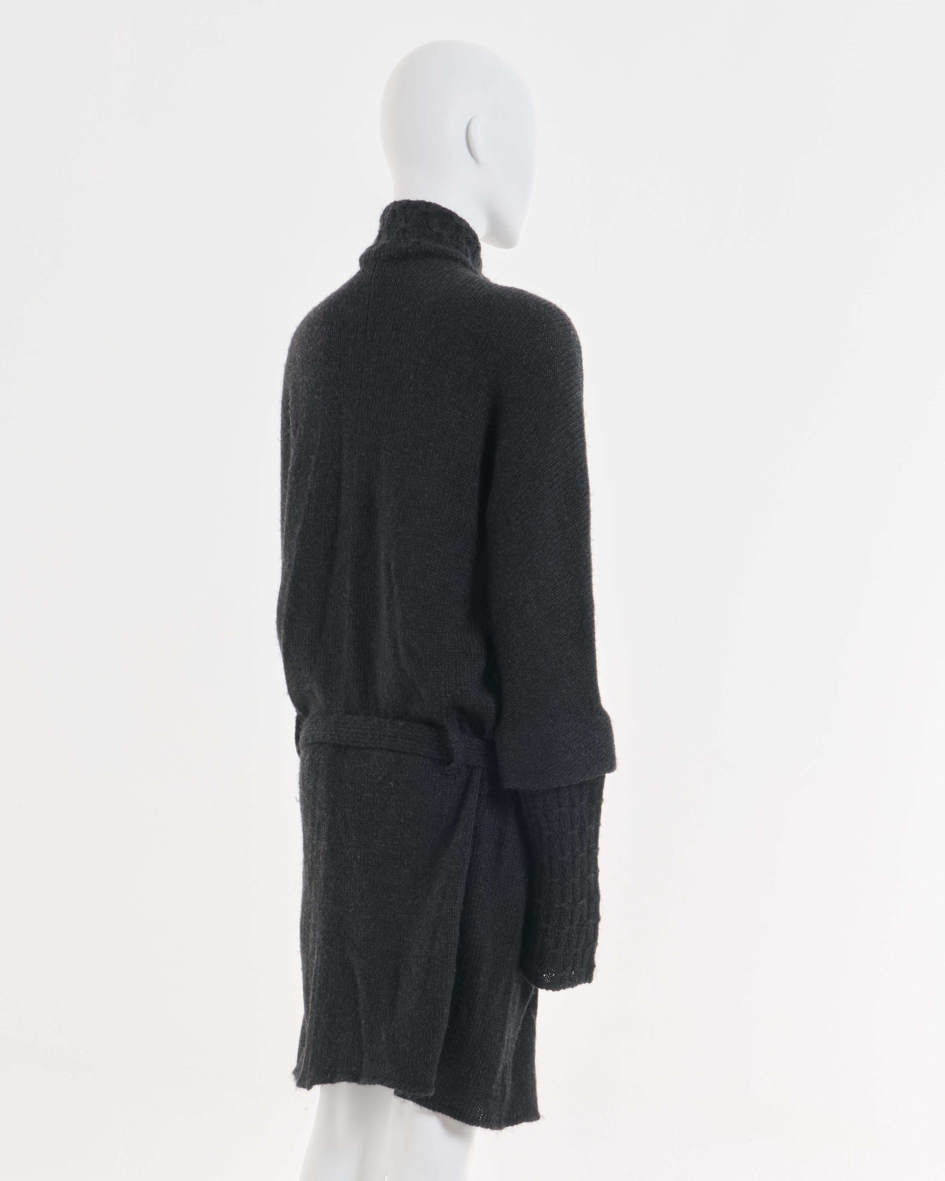- Designed by Nicolas Ghesquière
- Sold by Skof.Archive
- Black double-breasted knitted coat 
- A/W 2007 collection
- Knit detailing
- Double Breast Button Closure
- High Neck
- Knit belt at waist
- Made in Italy
- Excellent Condition
- Materials: