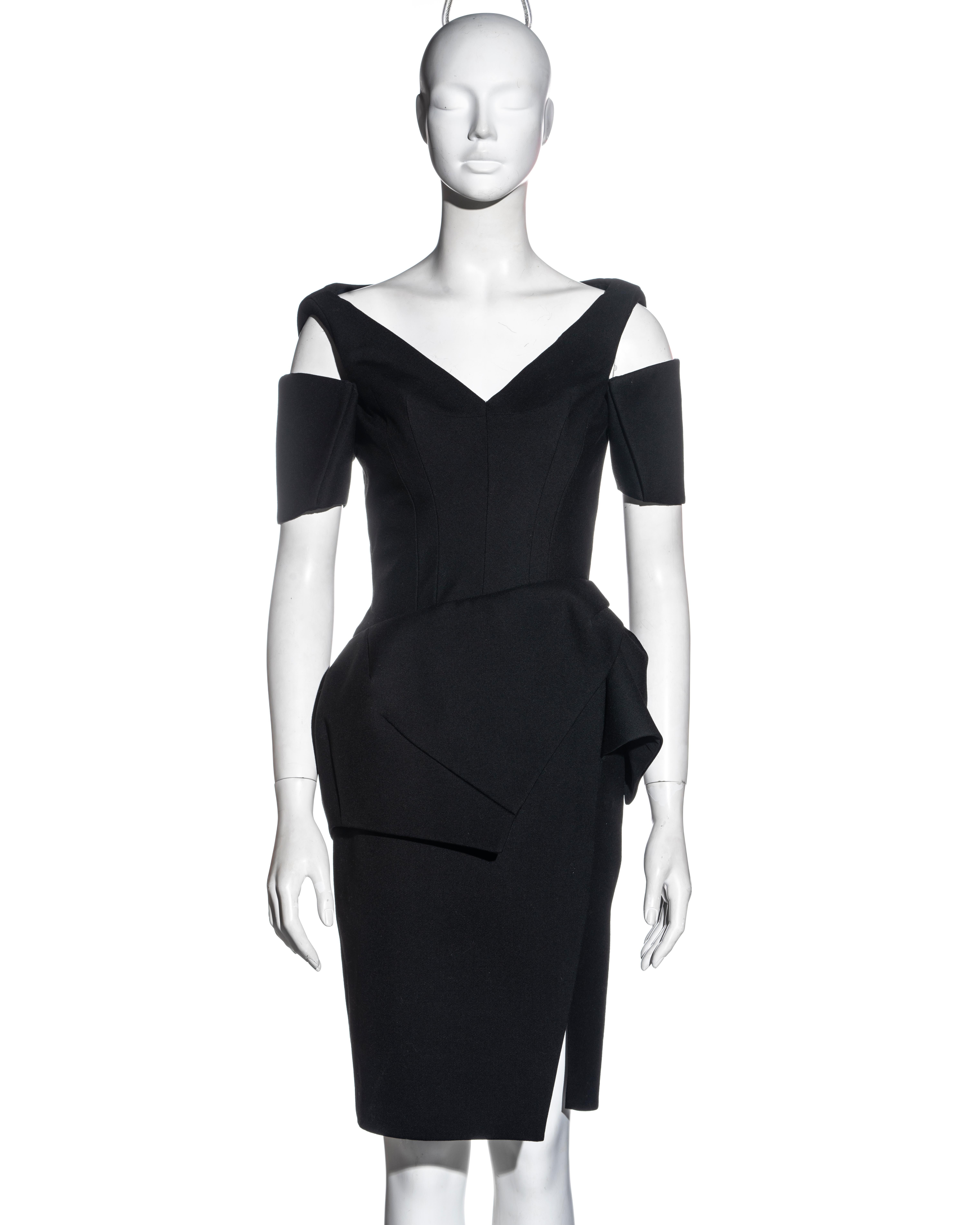 ▪ Balenciaga black wool structured cocktail dress 
▪ Designed by Nicolas Ghesquière 
▪ Black wool backed with neopreme
▪ Armband sleeves 
▪ Asymmetric draped peplum 
▪ Slit skirt  
▪ Corseted bodice 
▪ Padded shoulders  
▪ FR 36 - UK 8 - US 4
▪