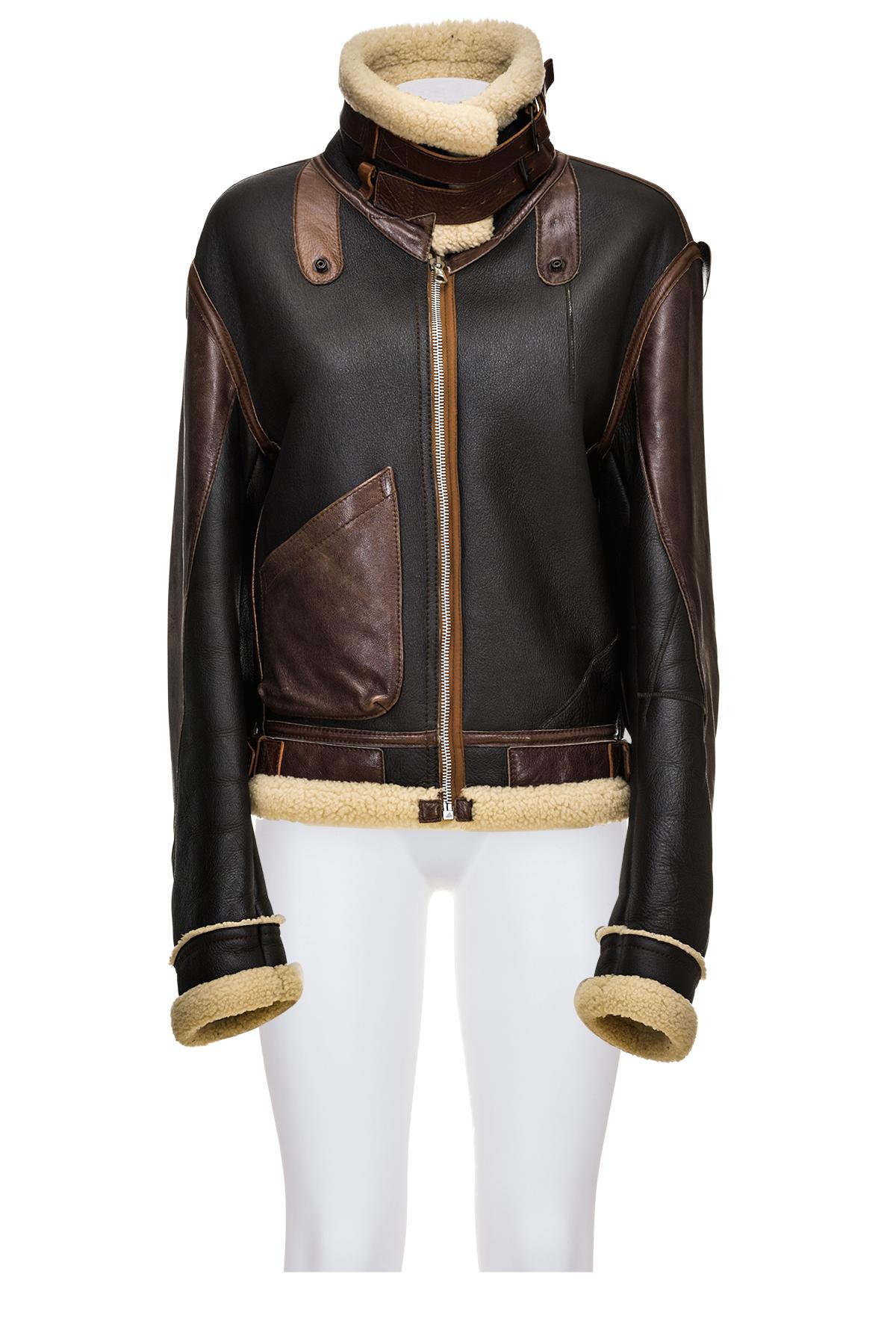 Fall Winter 2003 iconic shearling aviator jacket by Nicolas Ghesquière for Balenciaga. 
Zipper closure at front.
Two straps at collar.
One pocket.
The composition is 100% leather.