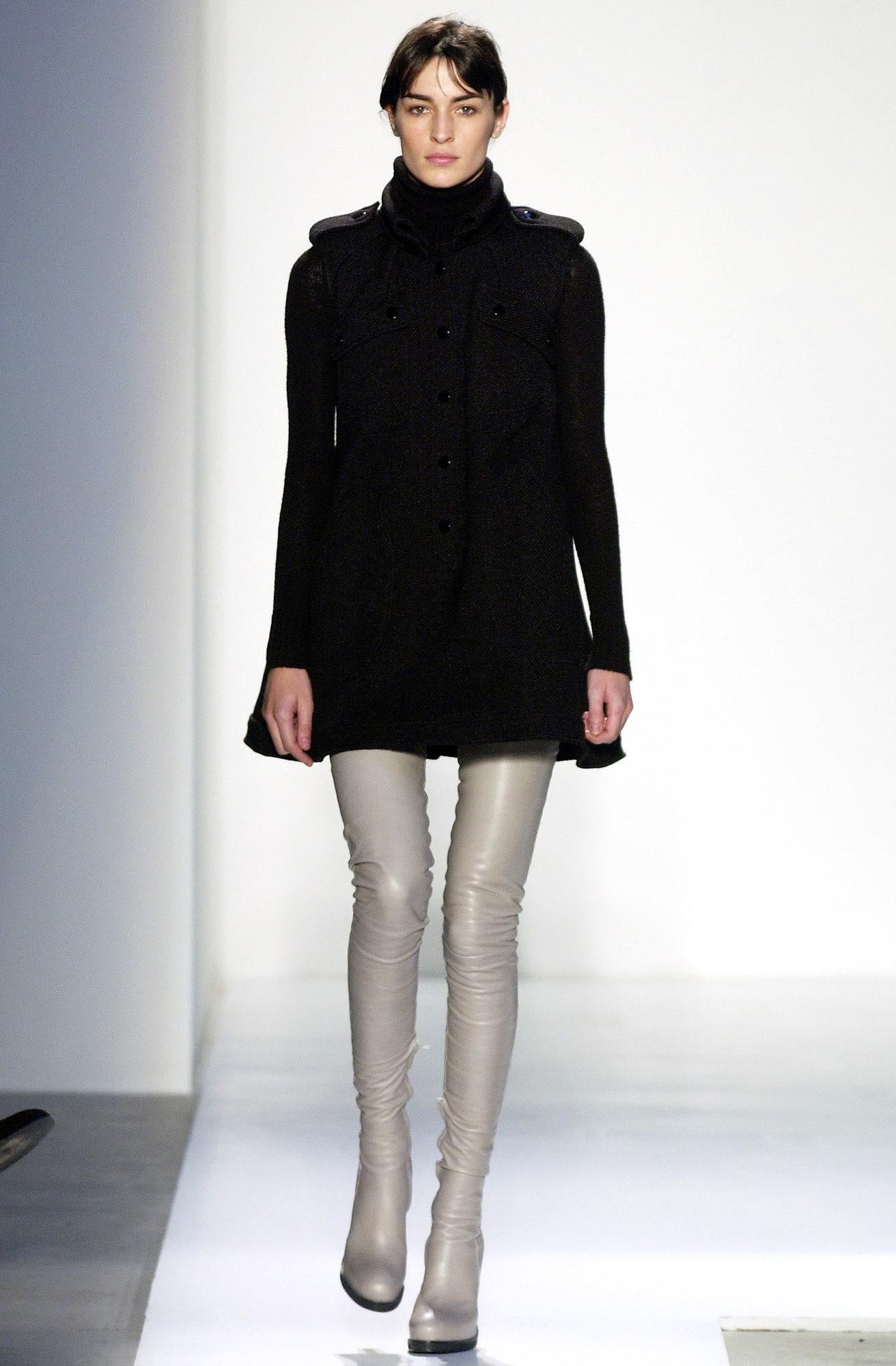 Balenciaga by Nicolas Ghesquière Sleeveless Military Mod Dress, Fall 2003 (Look 1)
Featured in Vogue  Size 36  Wool Blend  Made in France

A defining moment from the Fall 2003 Balenciaga runway, this dress opened the show with precision and power,