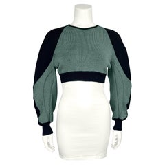 Balenciaga by Nicolas Ghesquière FW 2003: maglione patchwork verde e nero in passerella