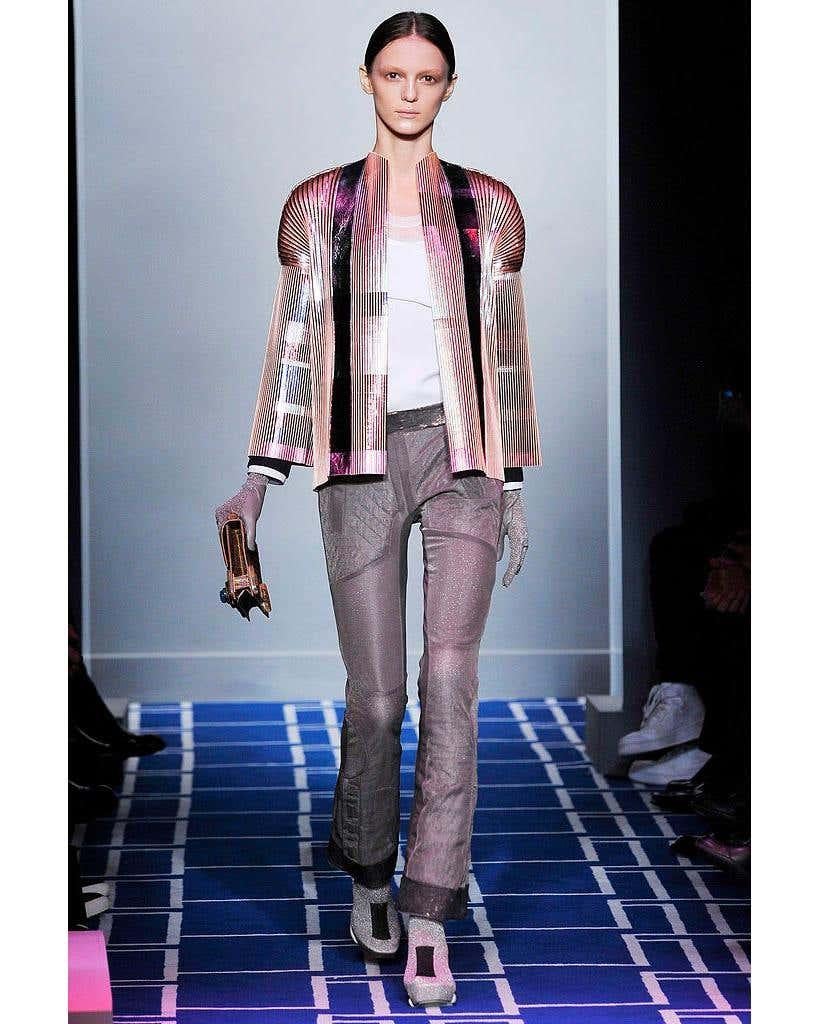 Highly collectable Balenciaga metallic silk pleated Jacket from the spring summer 2009 runway collection by Nicolas Ghesquière. The jacket is made of finely pleated copper silk with metal foil applied on top, features a high collar, long sleeves,