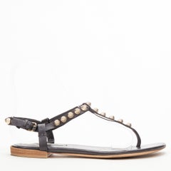 BALENCIAGA Cagole black leather gold textured  stud T-strap flat sandals EU38