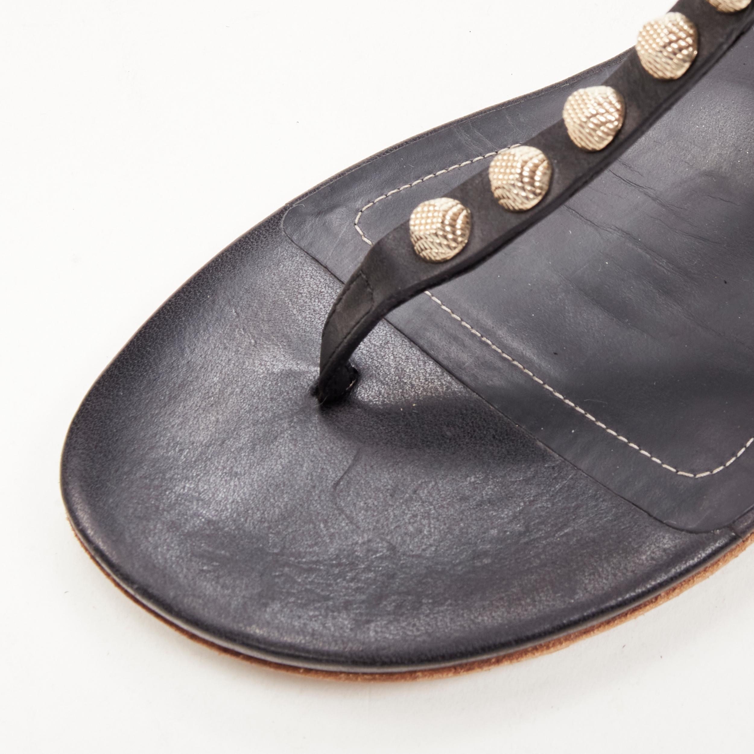 BALENCIAGA Cagole black leather gold textured  stud T-strap flat sandals EU38 For Sale 1