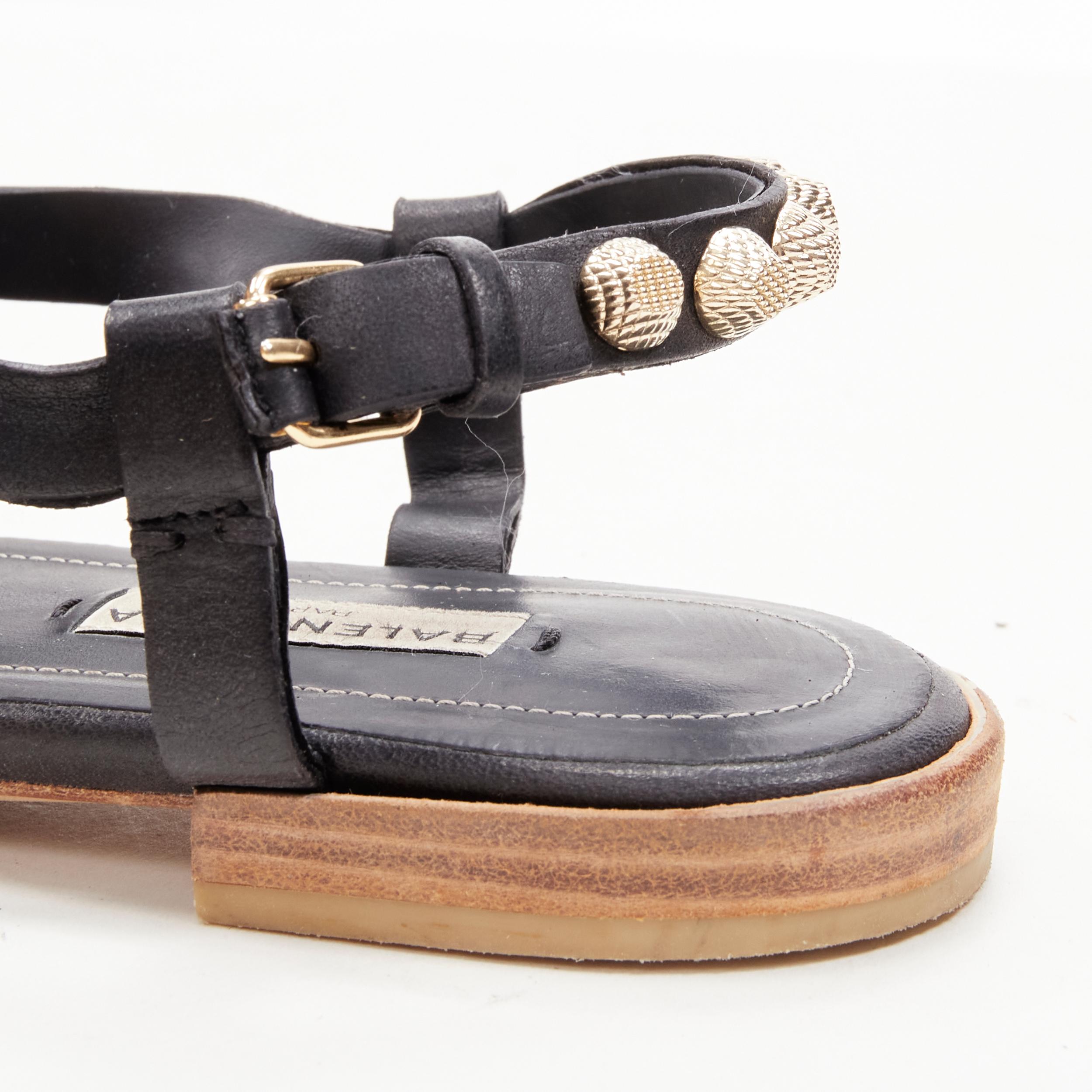 BALENCIAGA Cagole black leather gold textured  stud T-strap flat sandals EU38 For Sale 2