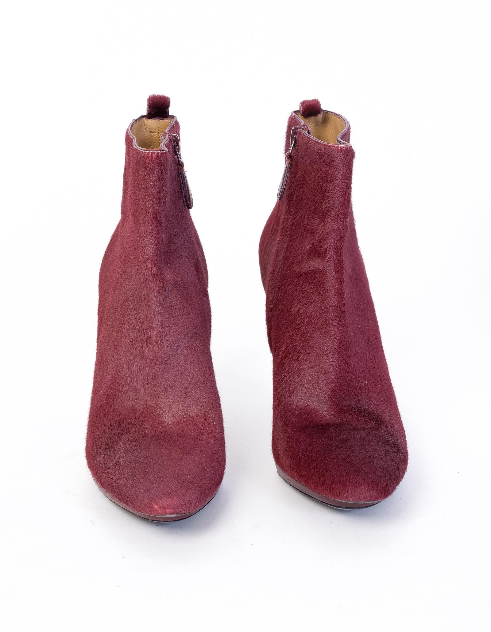 These heels feature a burgundy calf hair exterior, a light brown leather interior, a 4.24 inch heel, and black soles.

COLOR: Burgundy
MATERIAL: Calf hair
ITEM CODE: 299974
SIZE: 40 EU / 9 US
HEEL HEIGHT: 110 mm (4.25 inches)
EST. RETAIL $1100
COMES