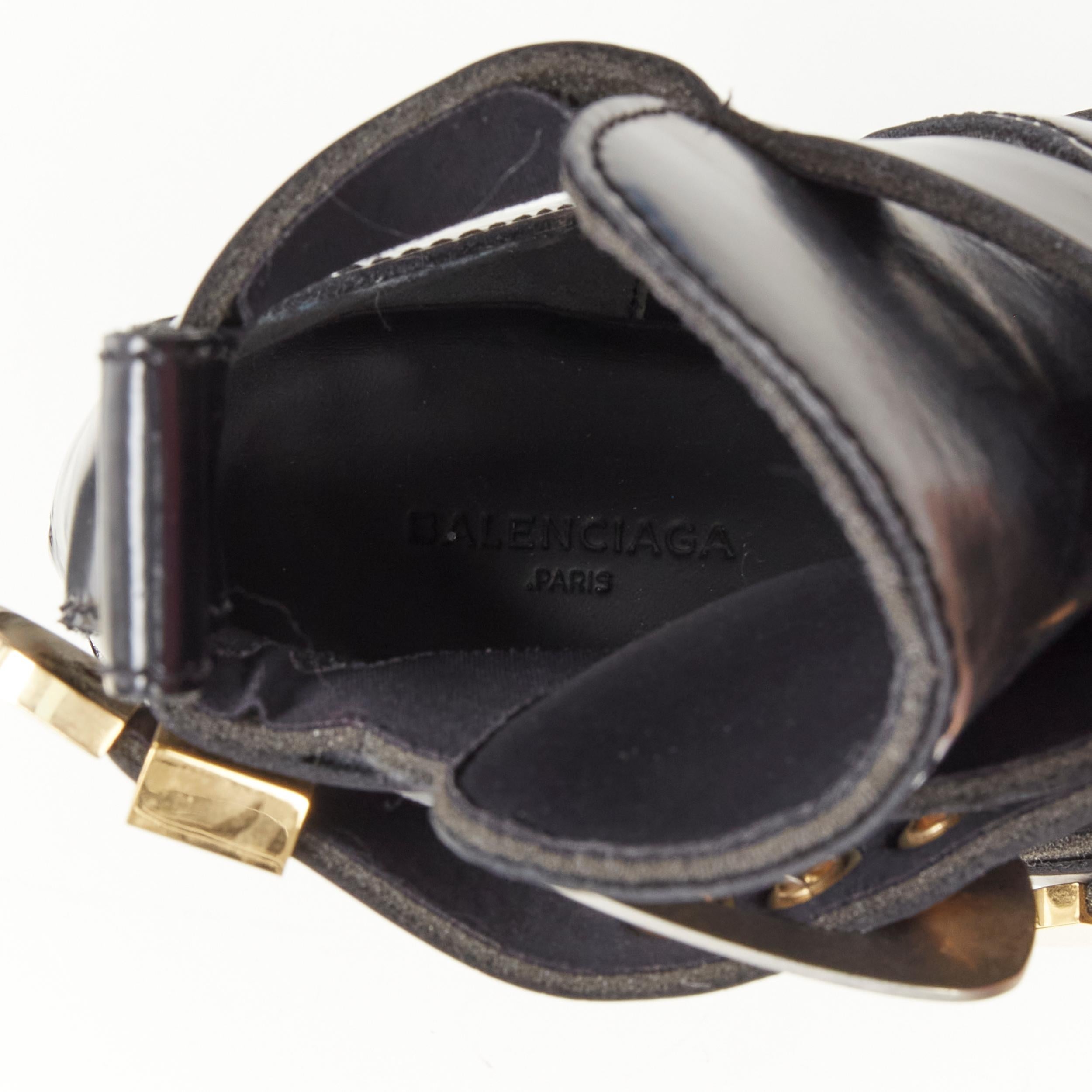 BALENCIAGA Ceinture black leather cut out mixed metals buckle moto boot EU39 4