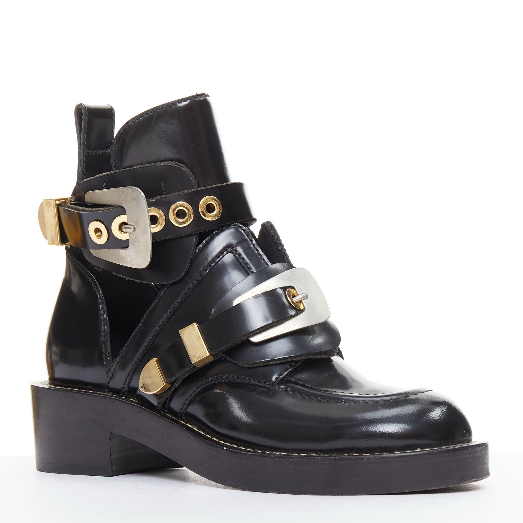 BALENCIAGA Ceinture negro mixto metal hardware negro recortado botas moto EU35.5
Referencia: ZETO/A00023
Marca: Balenciaga
Diseñador: Nicolas Ghesquiere
Model No: Ceinture
Material: Cuero, metal
Color: negro, dorado
Patrón: Sólido
Cierre: