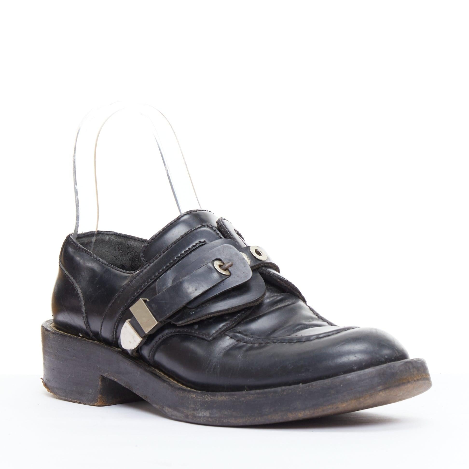 BALENCIAGA Ceinture black silver buckle strap monk brogue shoes EU39
Reference: ECLO/A00116
Brand: Balenciaga
Collection: Ceinture
Material: Leather
Color: Black, Silver
Pattern: Solid
Closure: Buckle
Lining: Black Fabric
Extra Details: Flat black