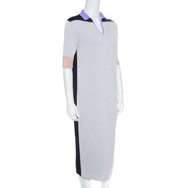 In a perfect blend of modern style and feminity, this dress from Balenciaga's Spring 2015 Ready-to-Wear is a creation for every woman's closet. With a colorblock design and a midi-hem, the shift dress is a winner with high heels and flats as